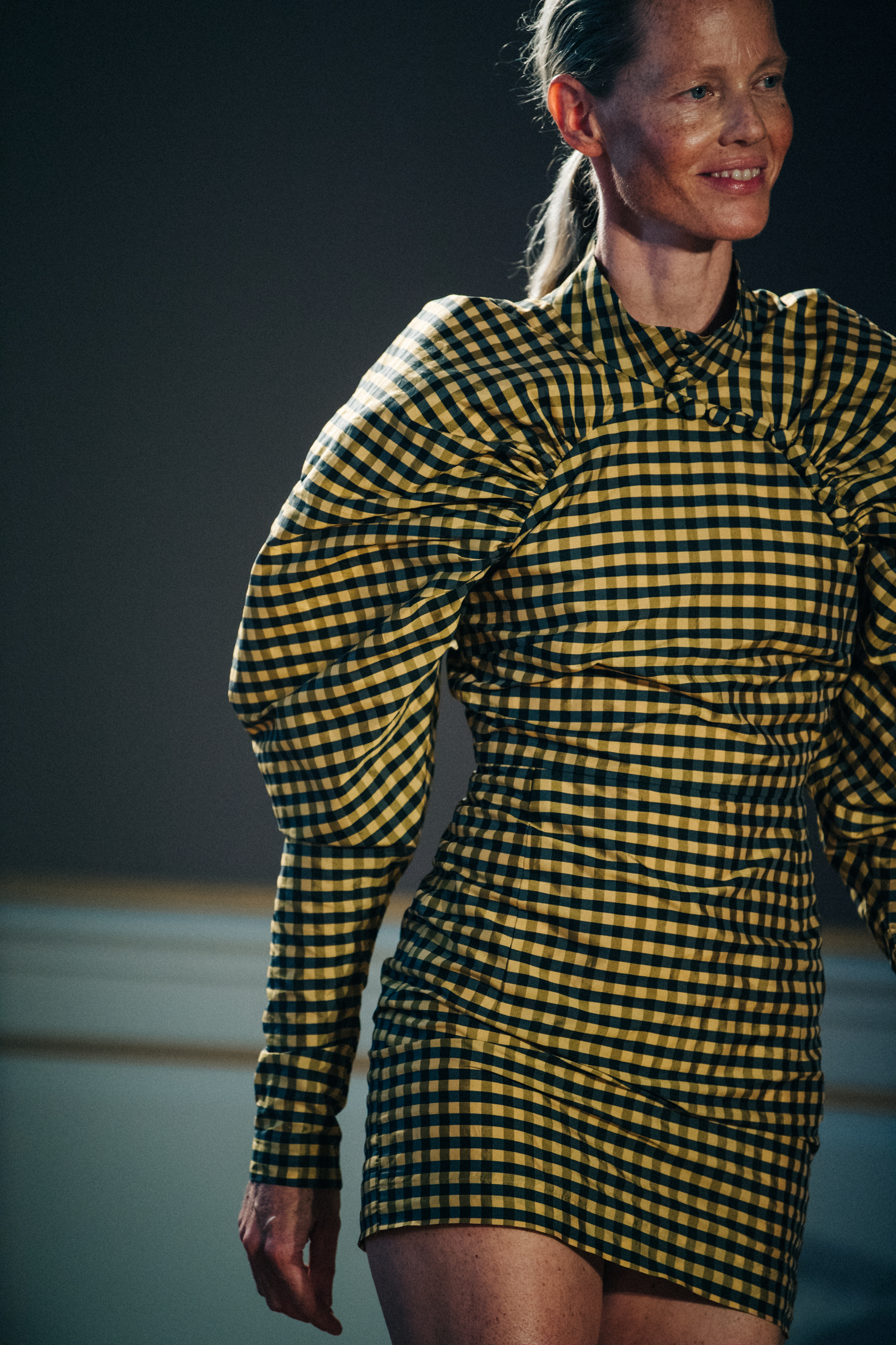 Model wearing yellow check dress at Birger Christensen