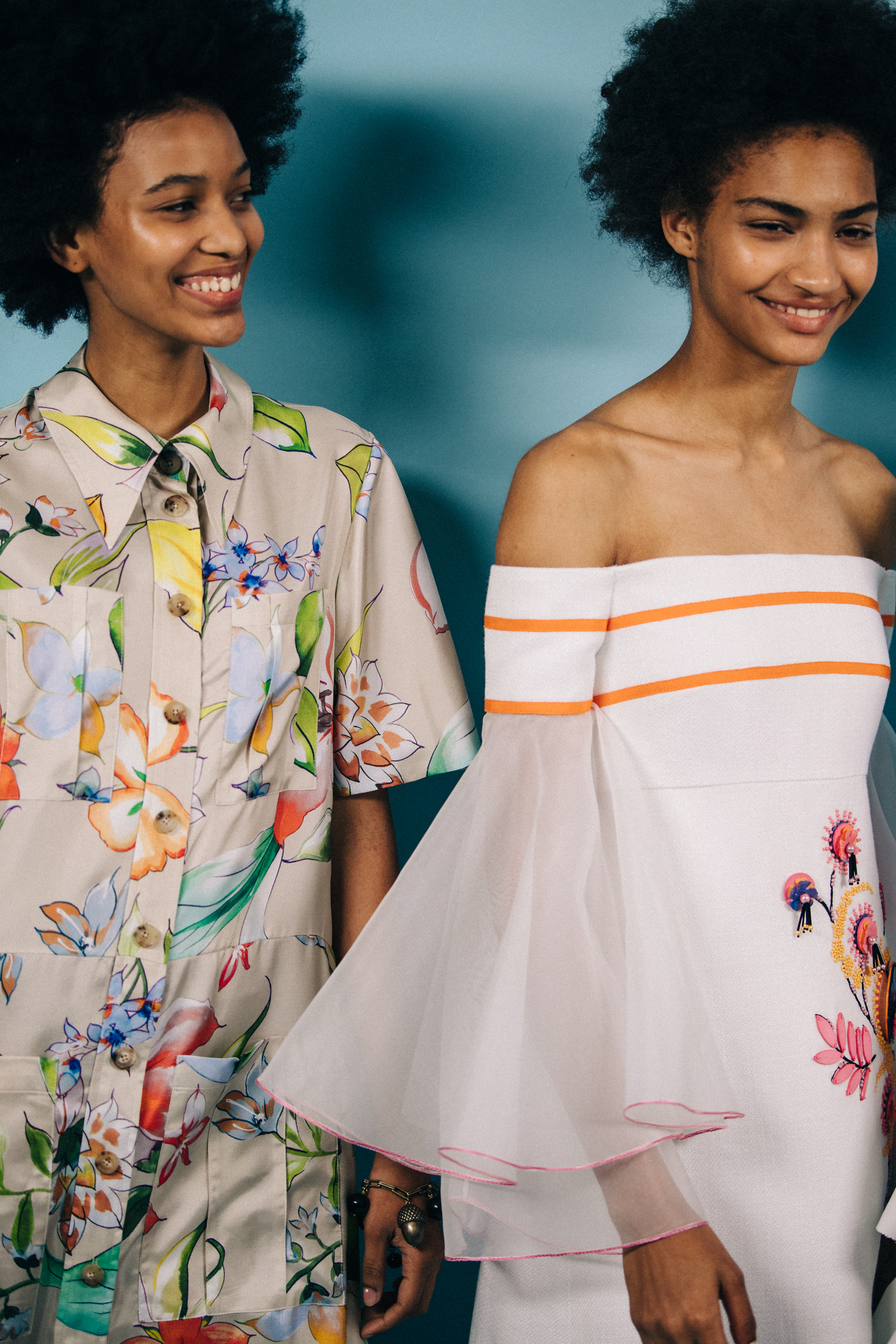 Models wearing colourful dresses at Carolina Herrera