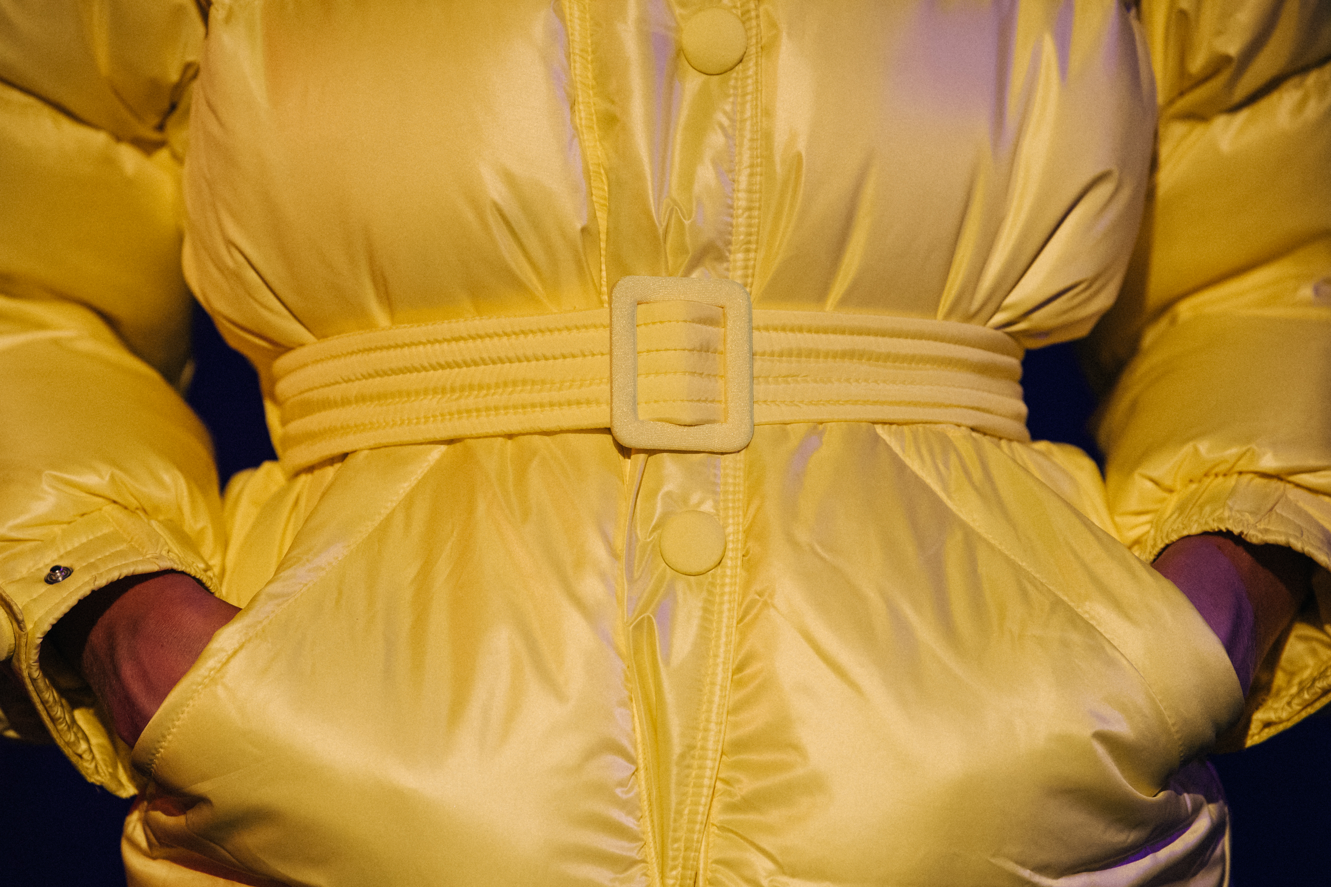 Models wearing yellow lenki lenki coats