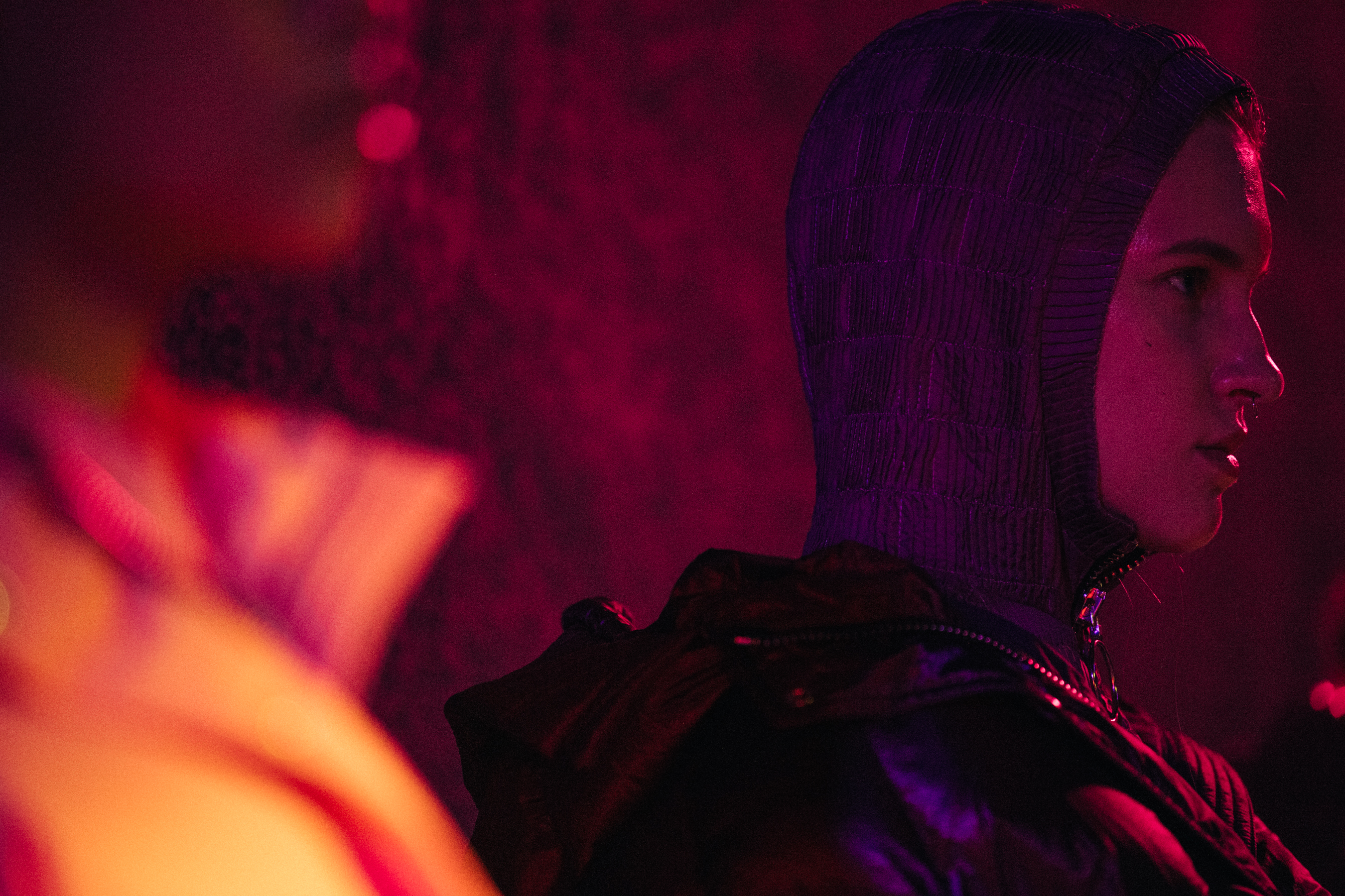 Model wearing hooded coat