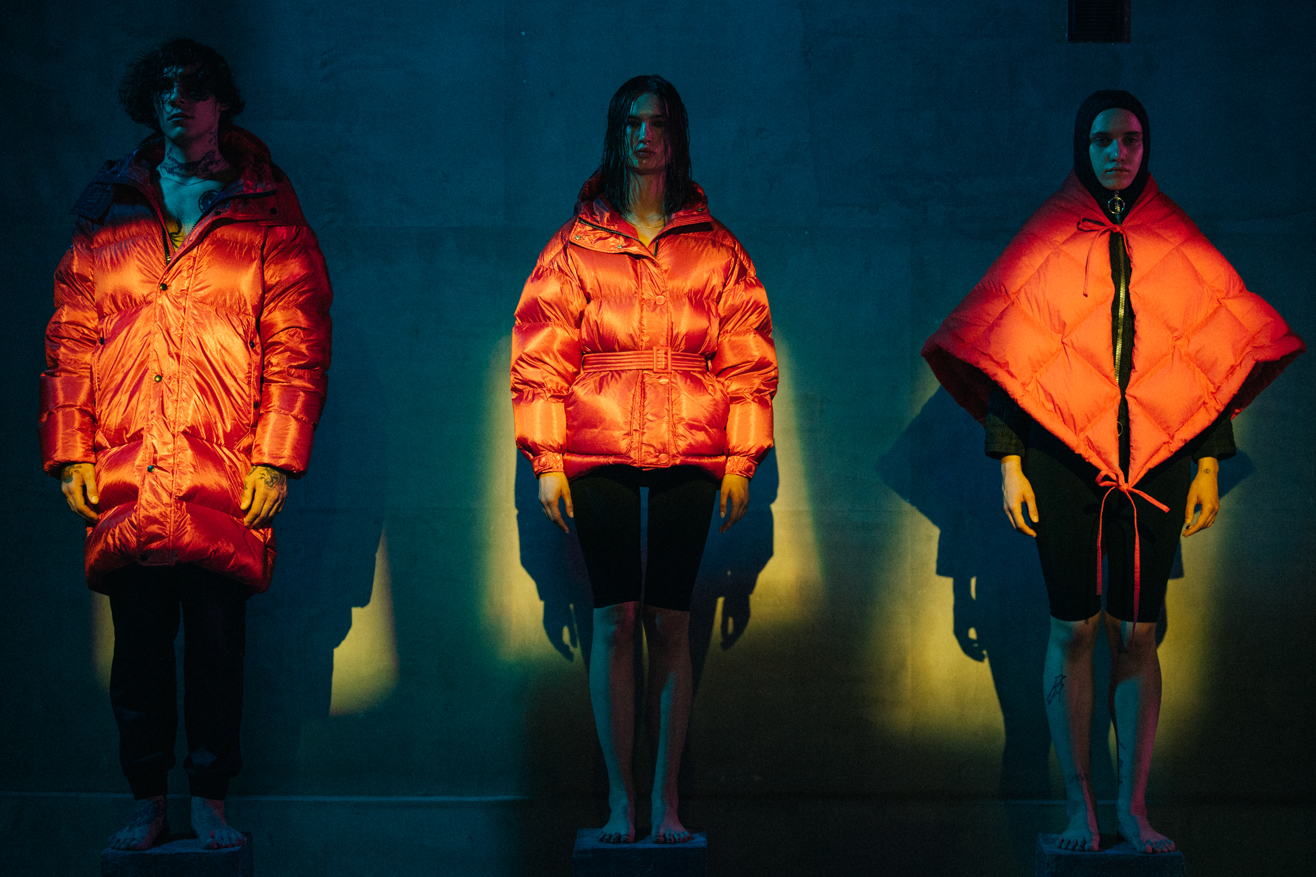 Models wearing red lenki lenki coats
