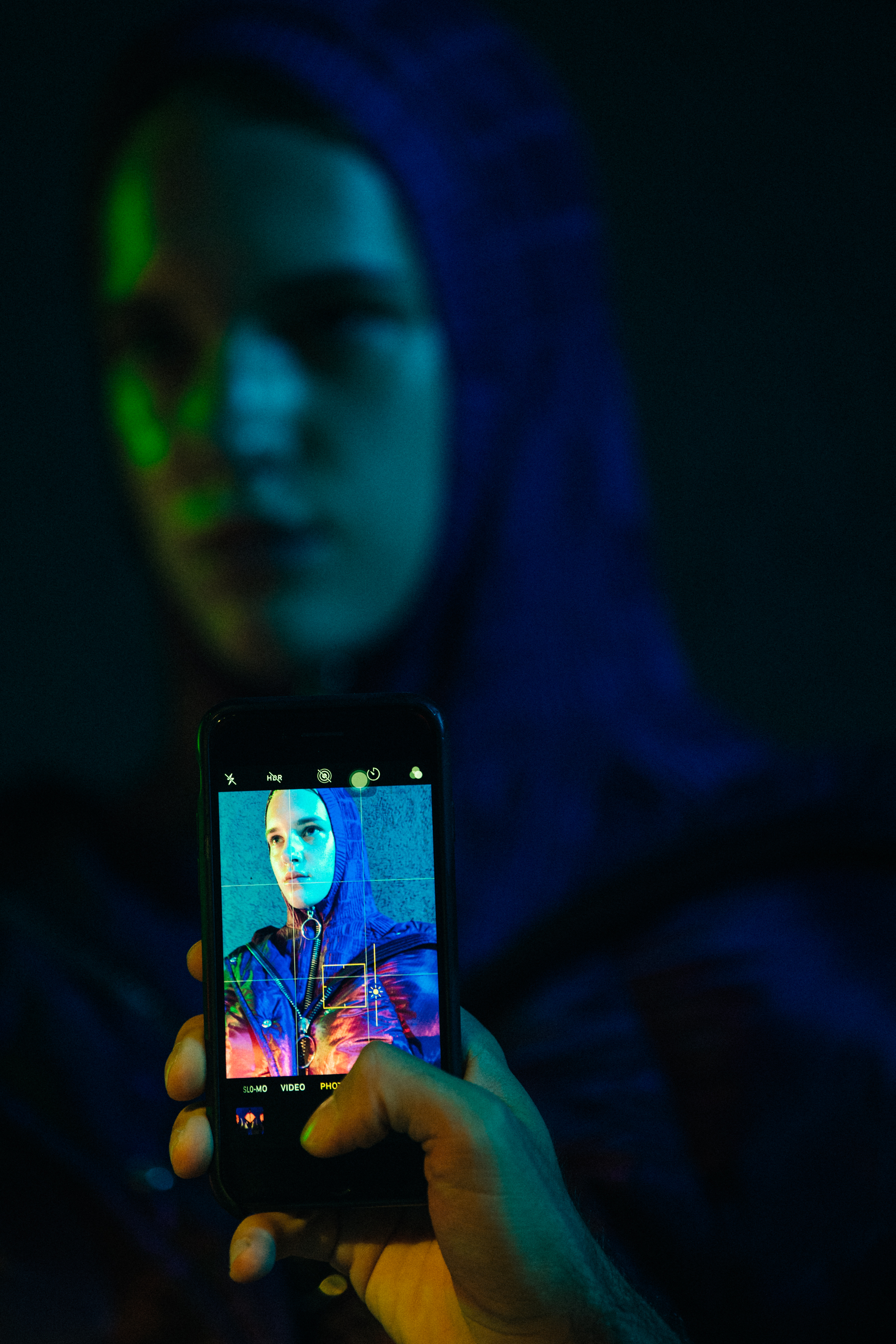Model wearing hooded coat
