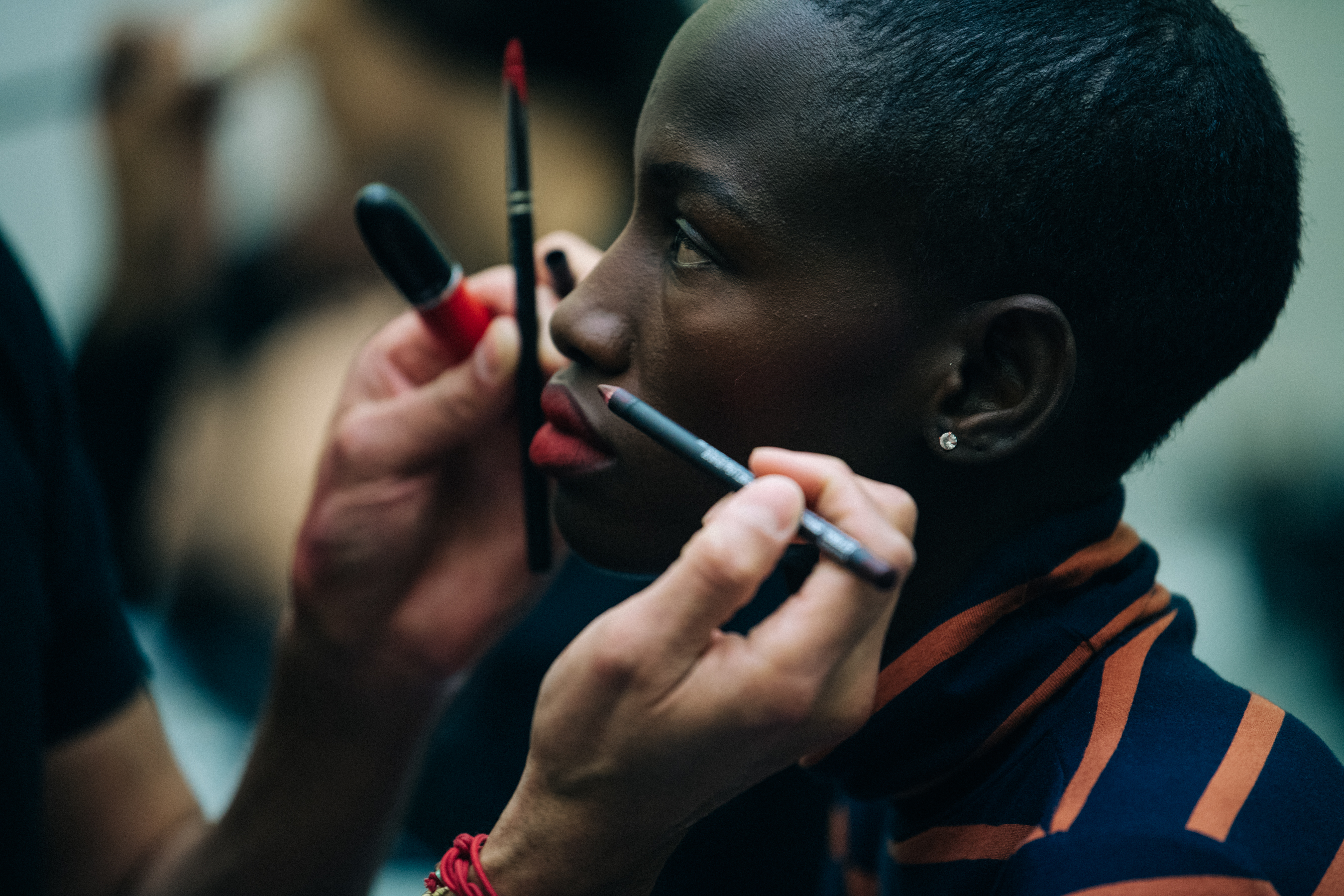 Model having hair and makeup done