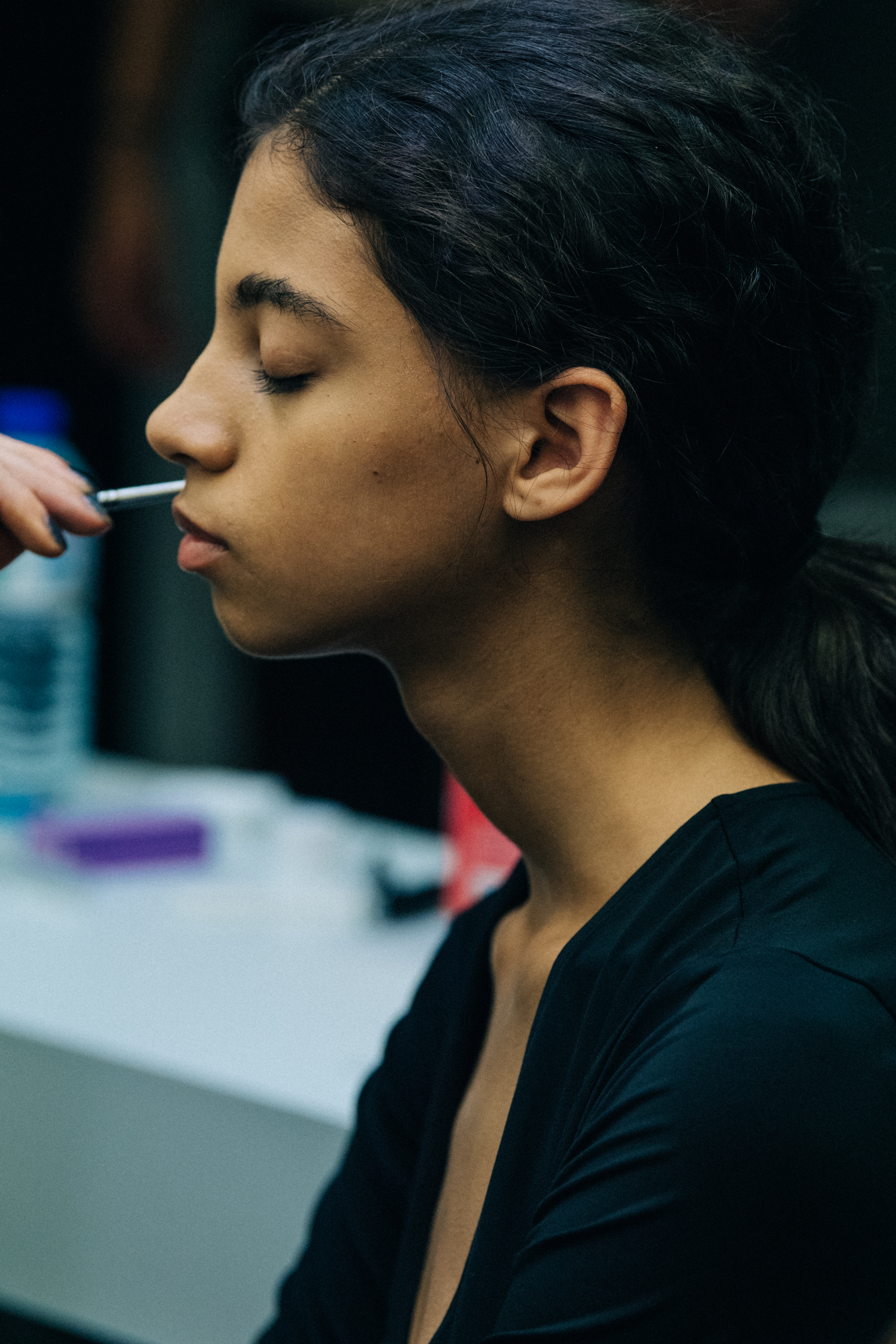 Model having hair and makeup done