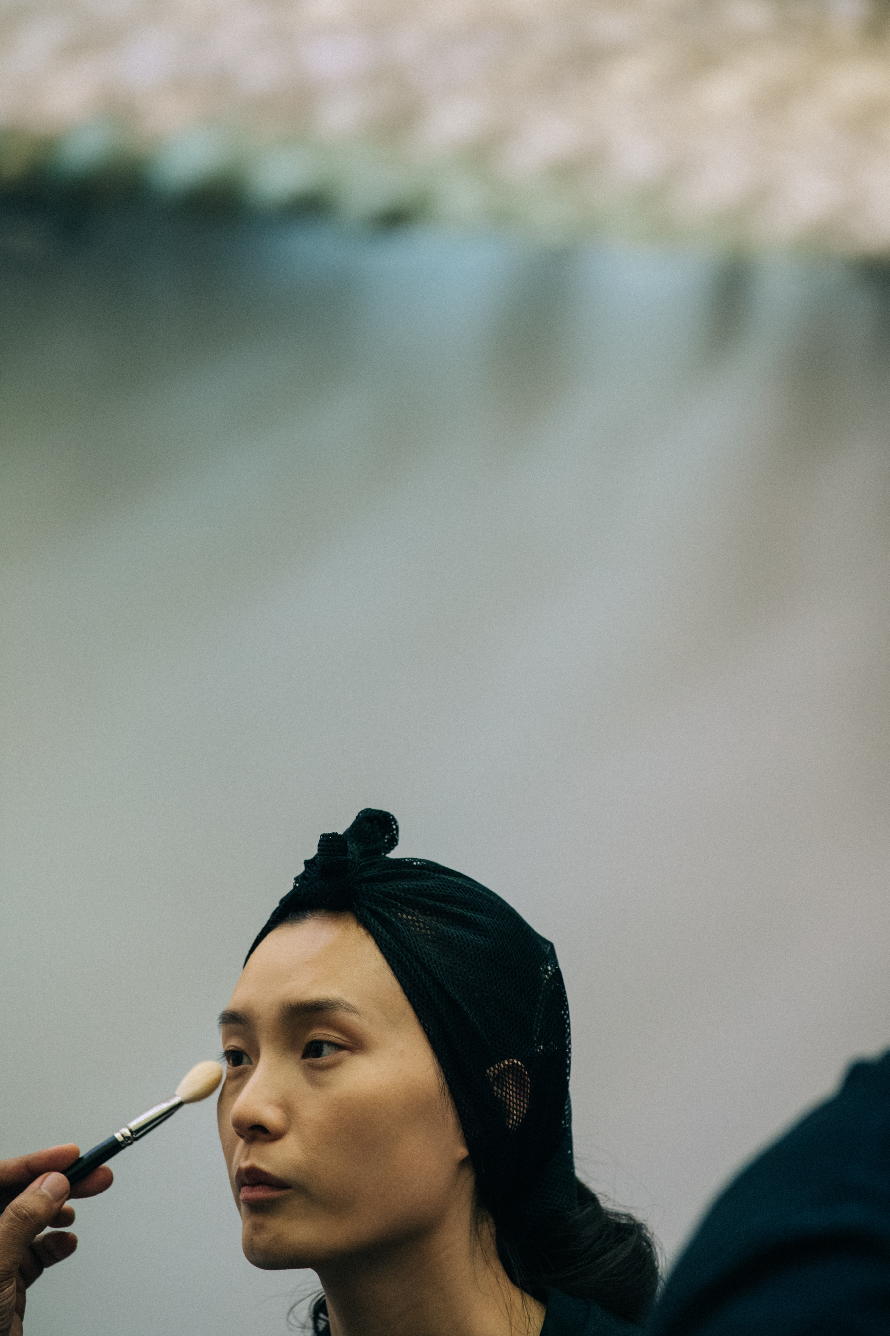 Model having hair and makeup done