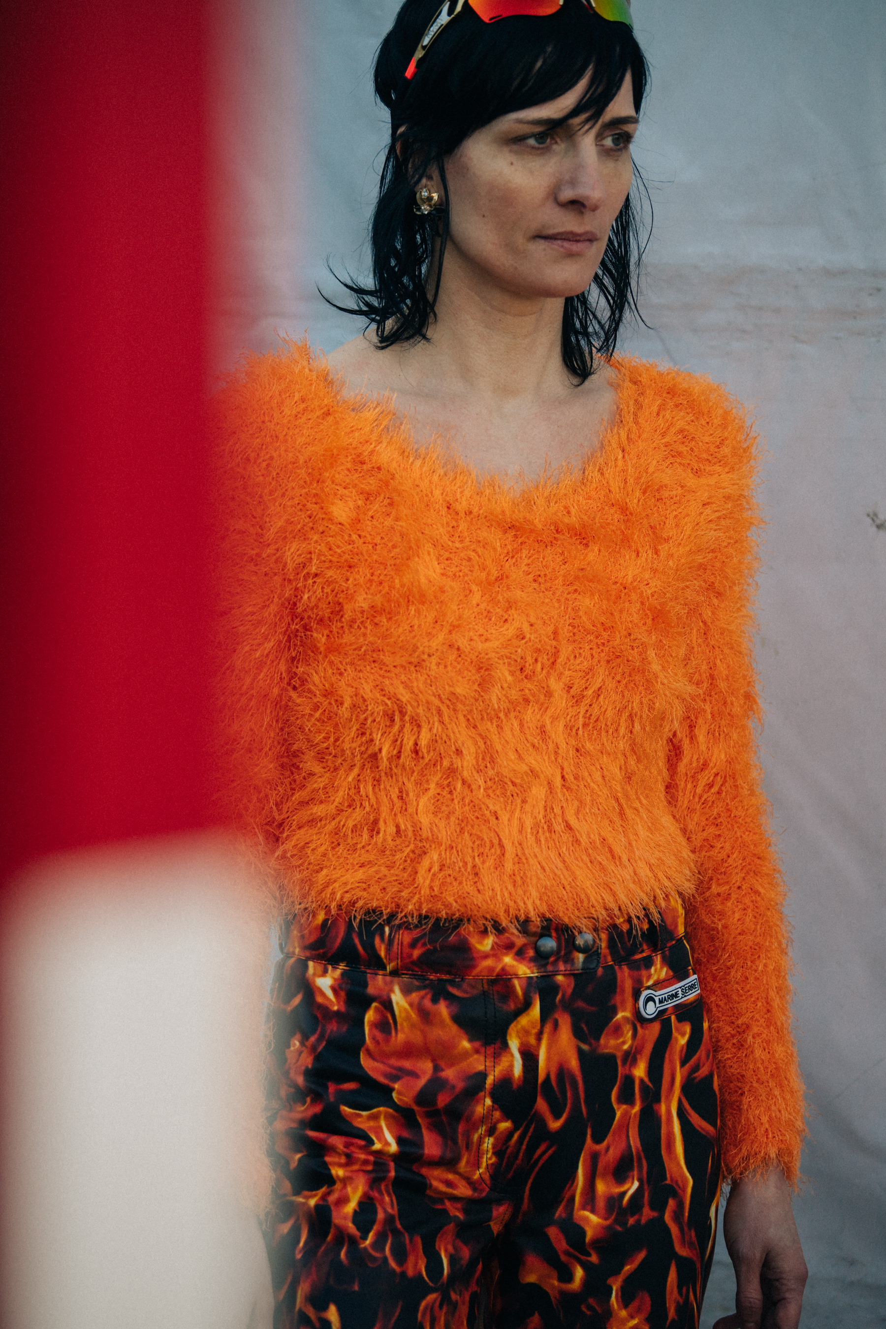 Model wearing orange Marine Serre outfit