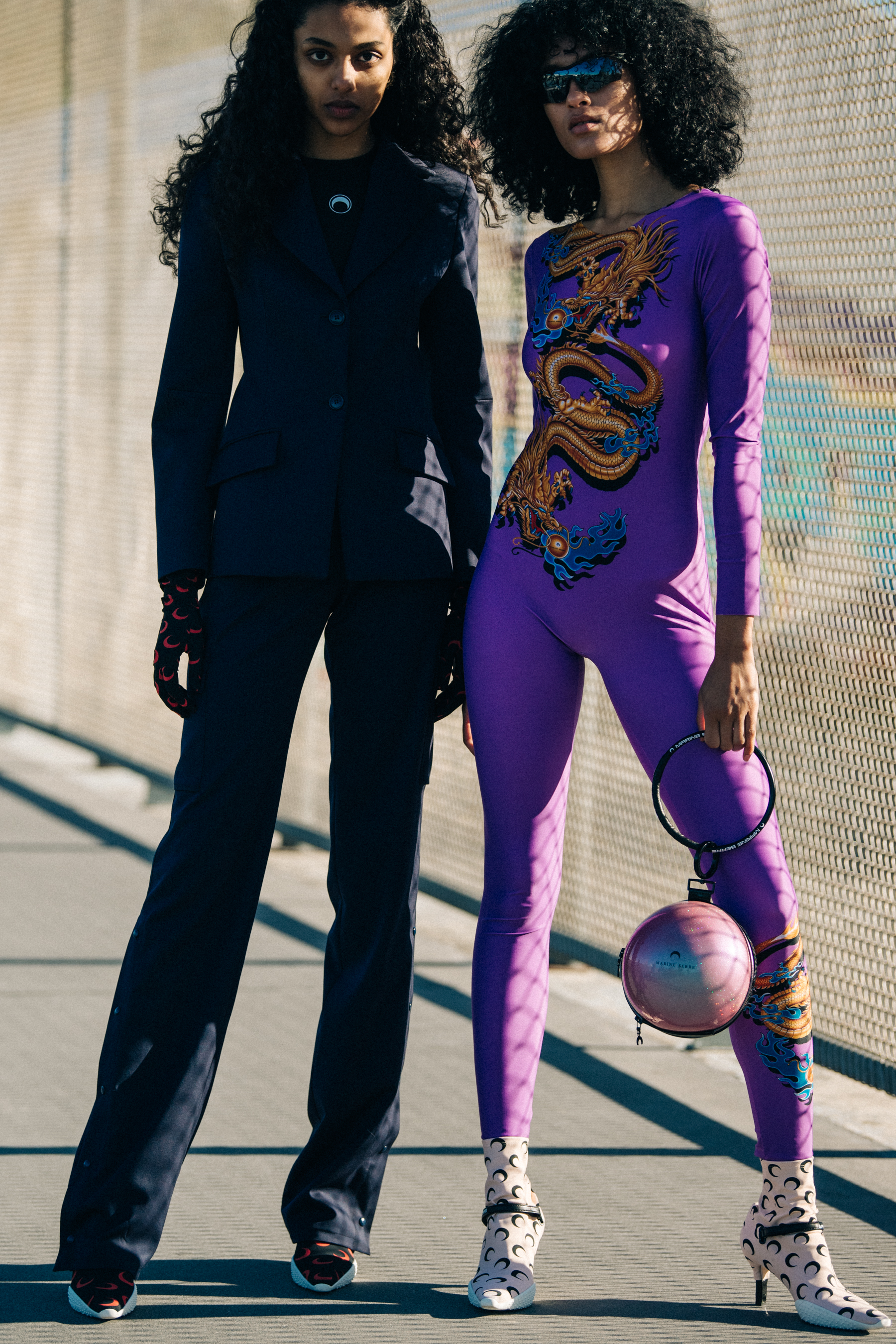 Model wearing purple jumpsuit at Marine Serre
