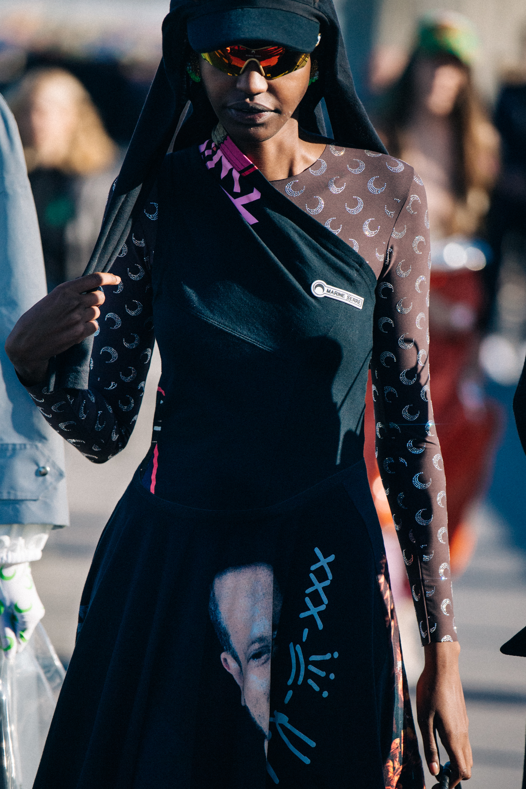 Model wearing pattern cap