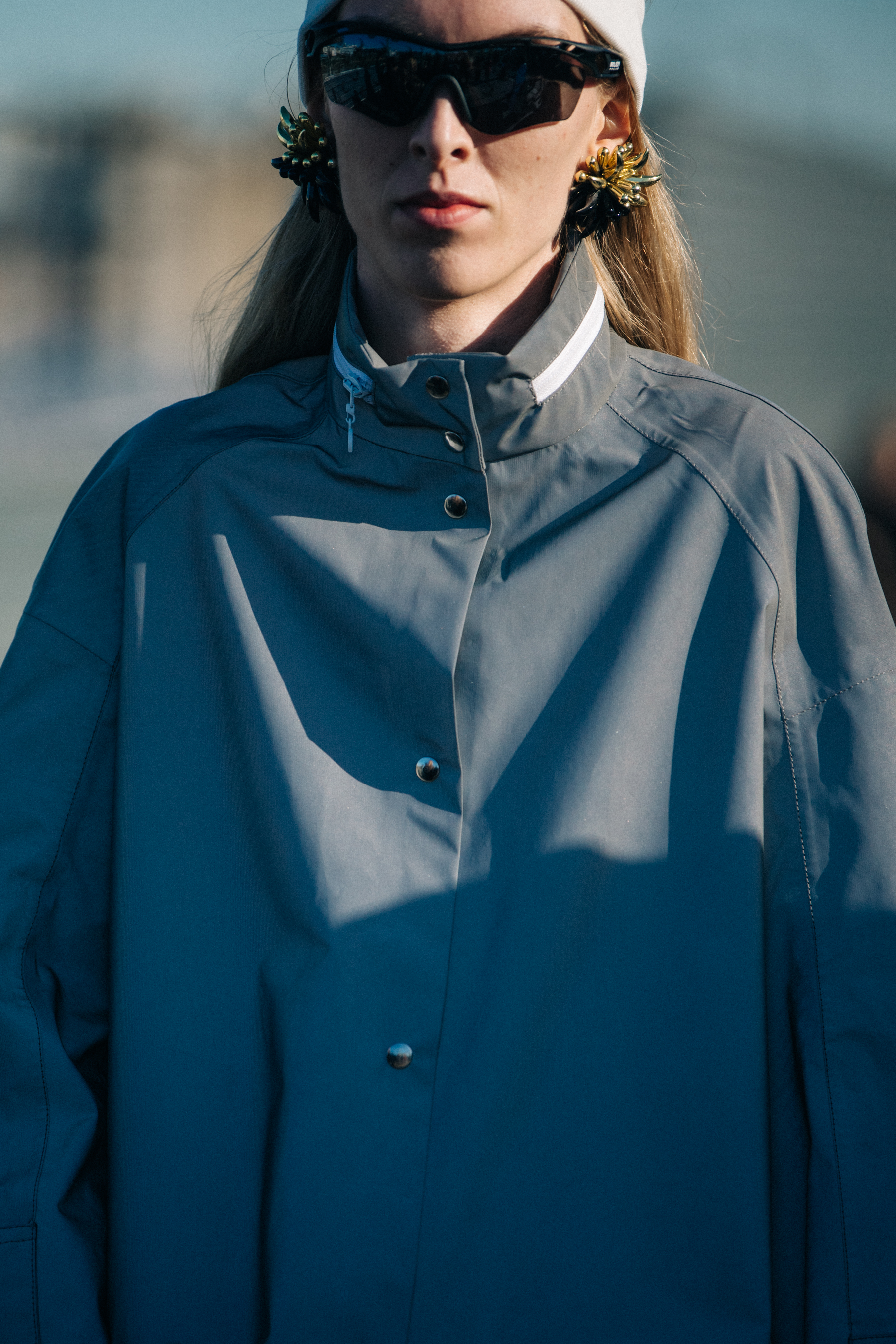 Model wearing grey outfit at Marine Serre