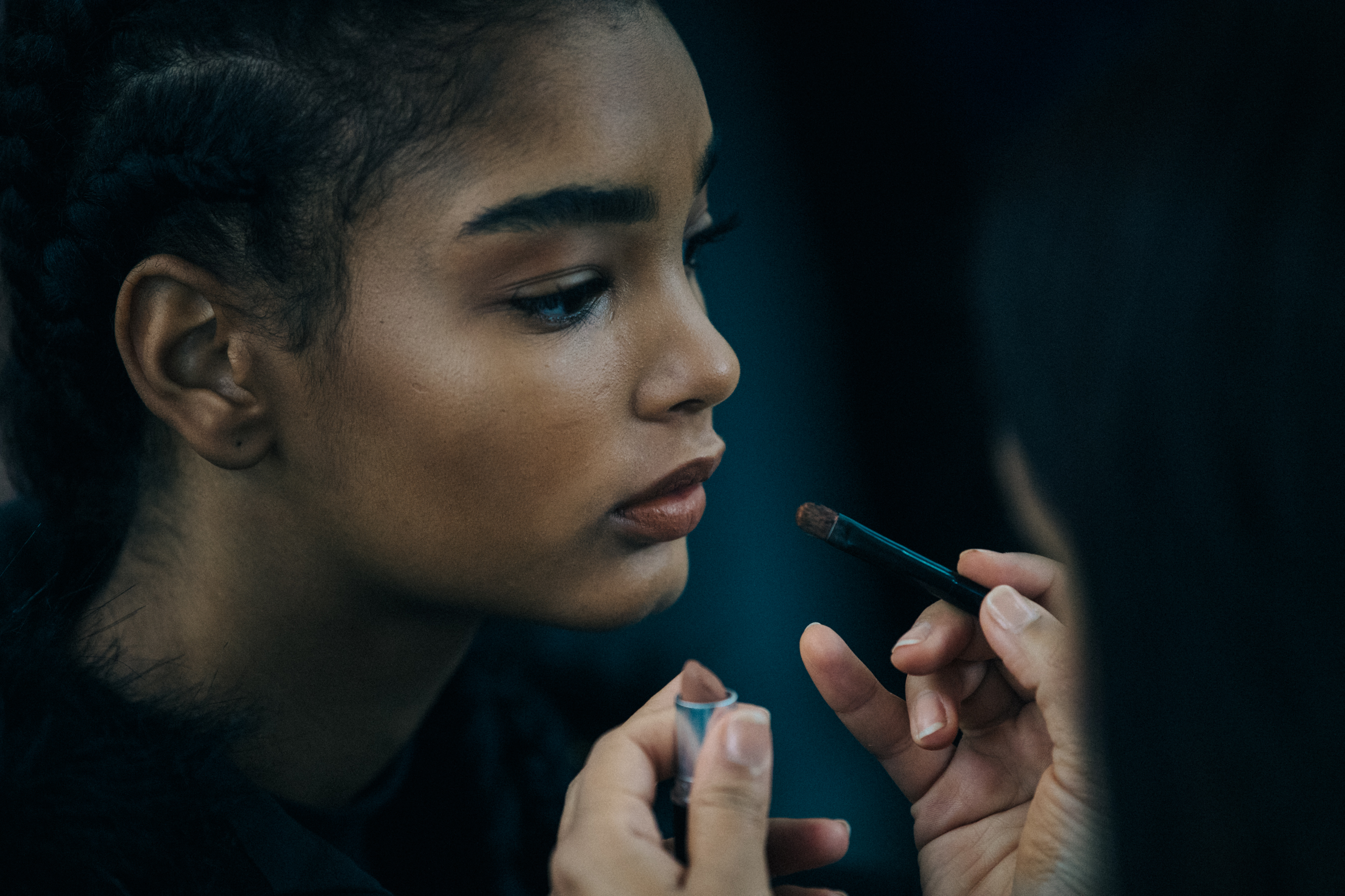 Model in hair and makeup backstage