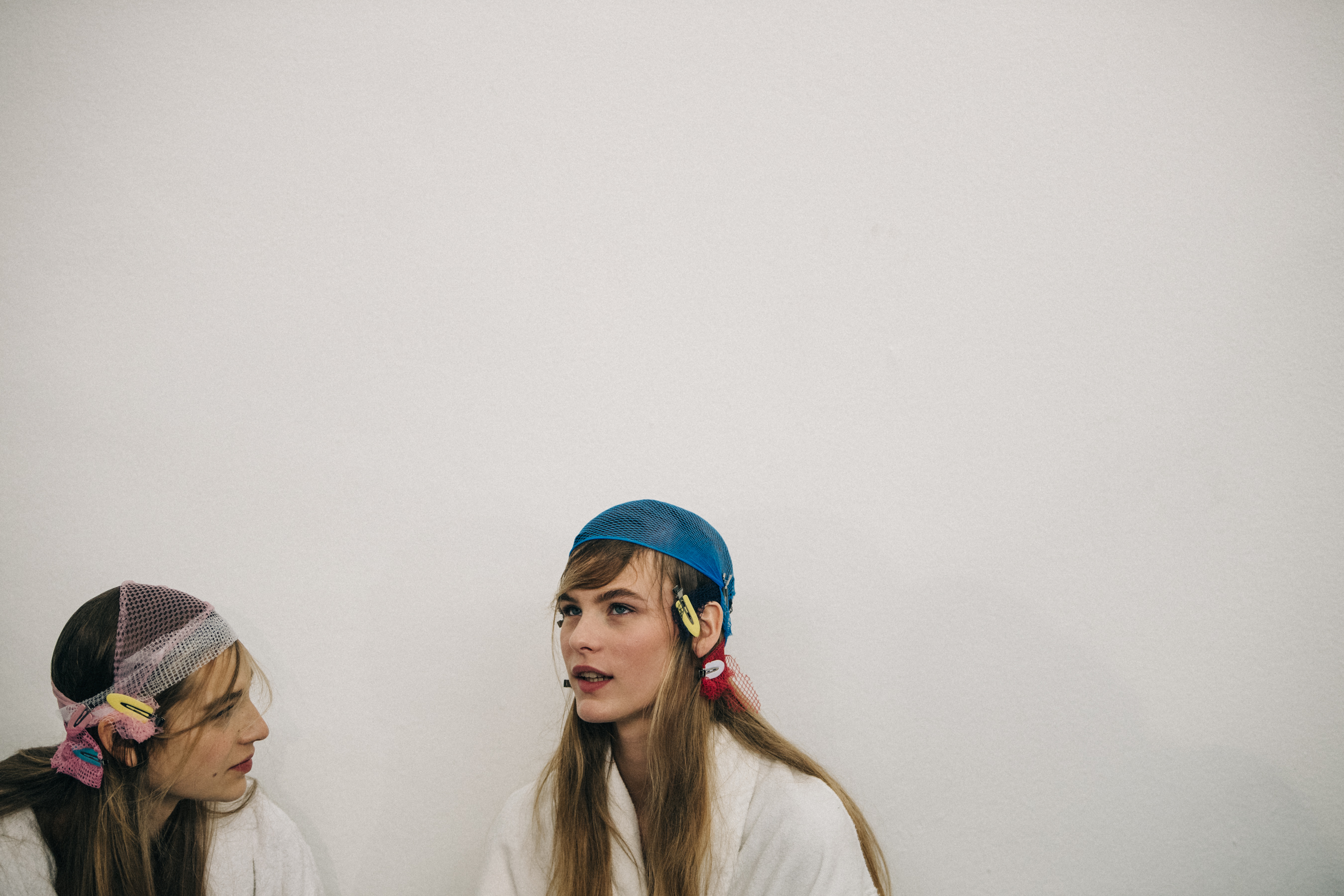 Model in hair and makeup backstage
