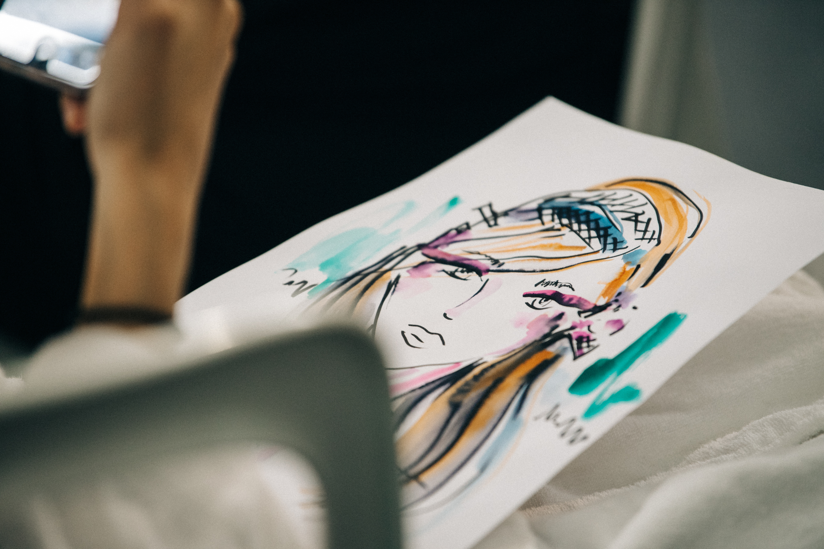 Model cards backstage at Sacai