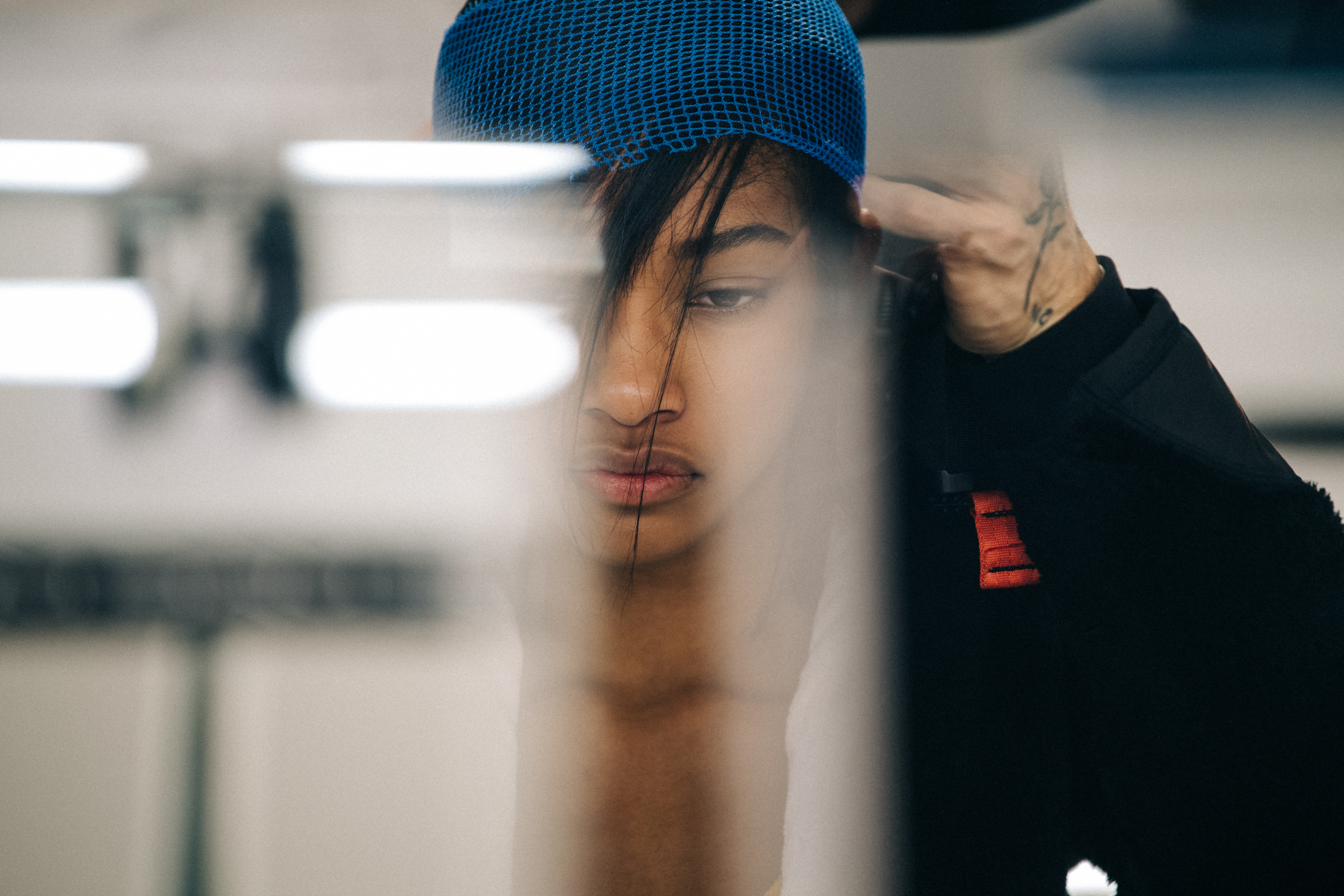 Model in hair and makeup backstage