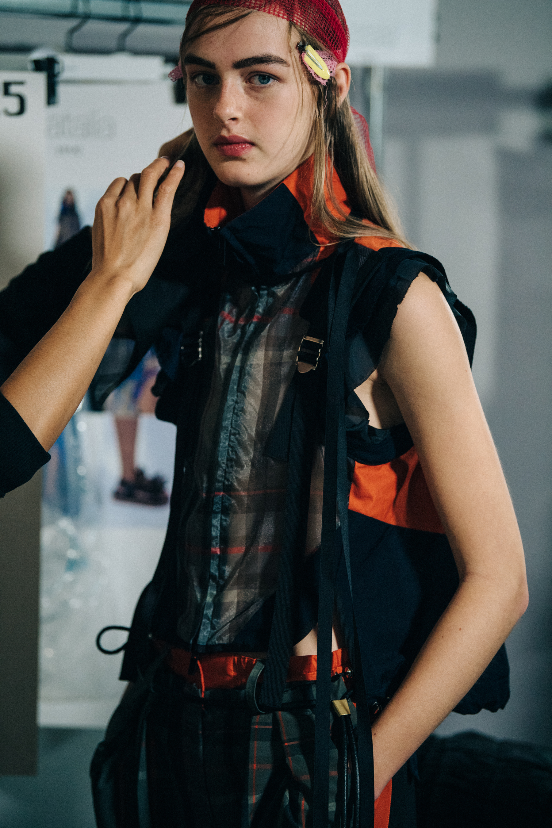 Model in hair and makeup backstage