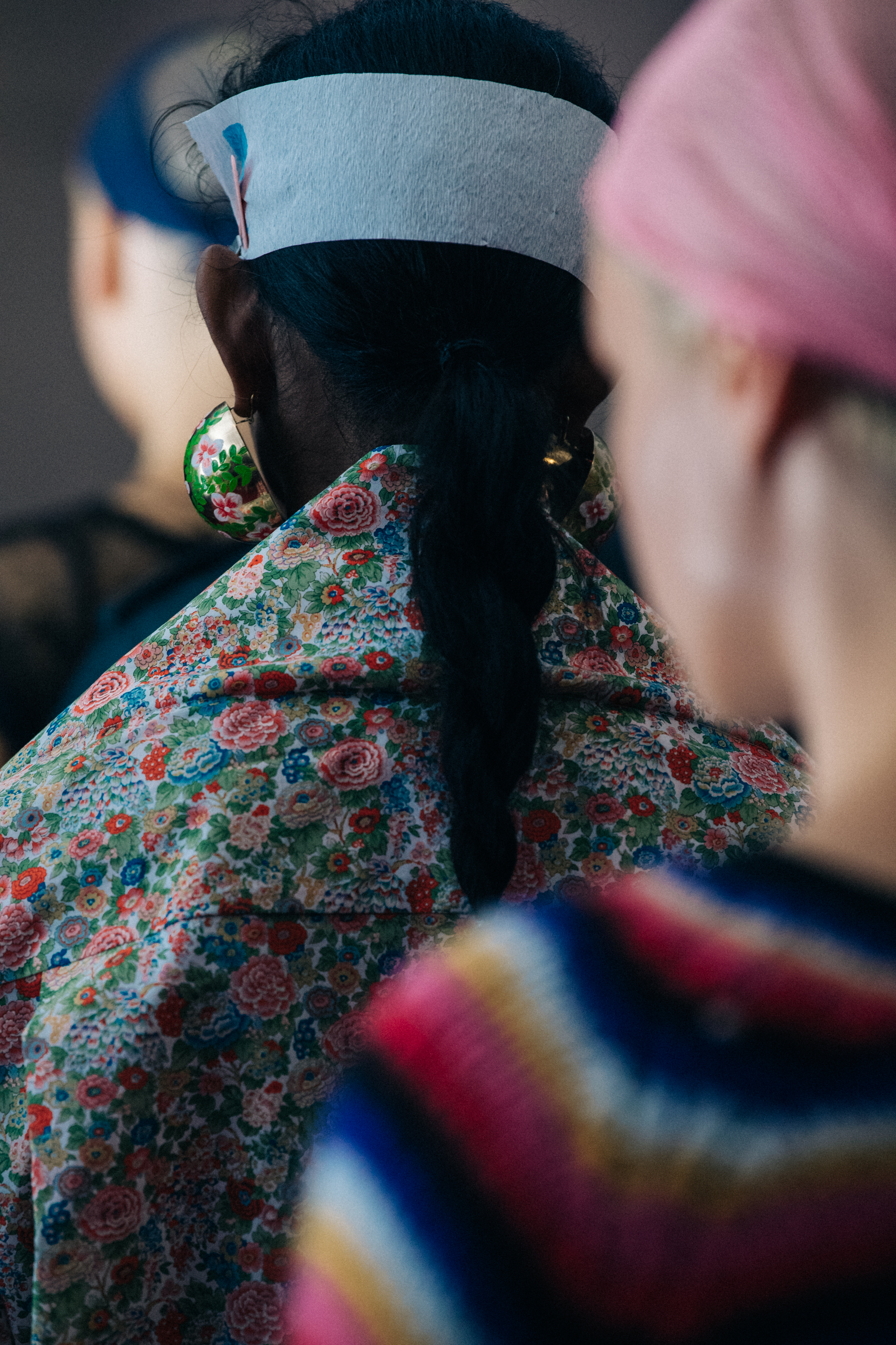 Model wearing large earrings at Y/Project