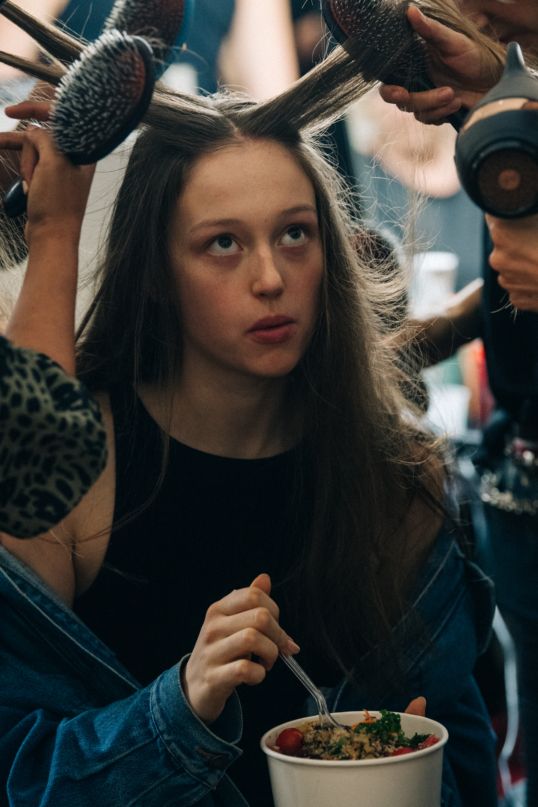 Model in hair and makeup backstage