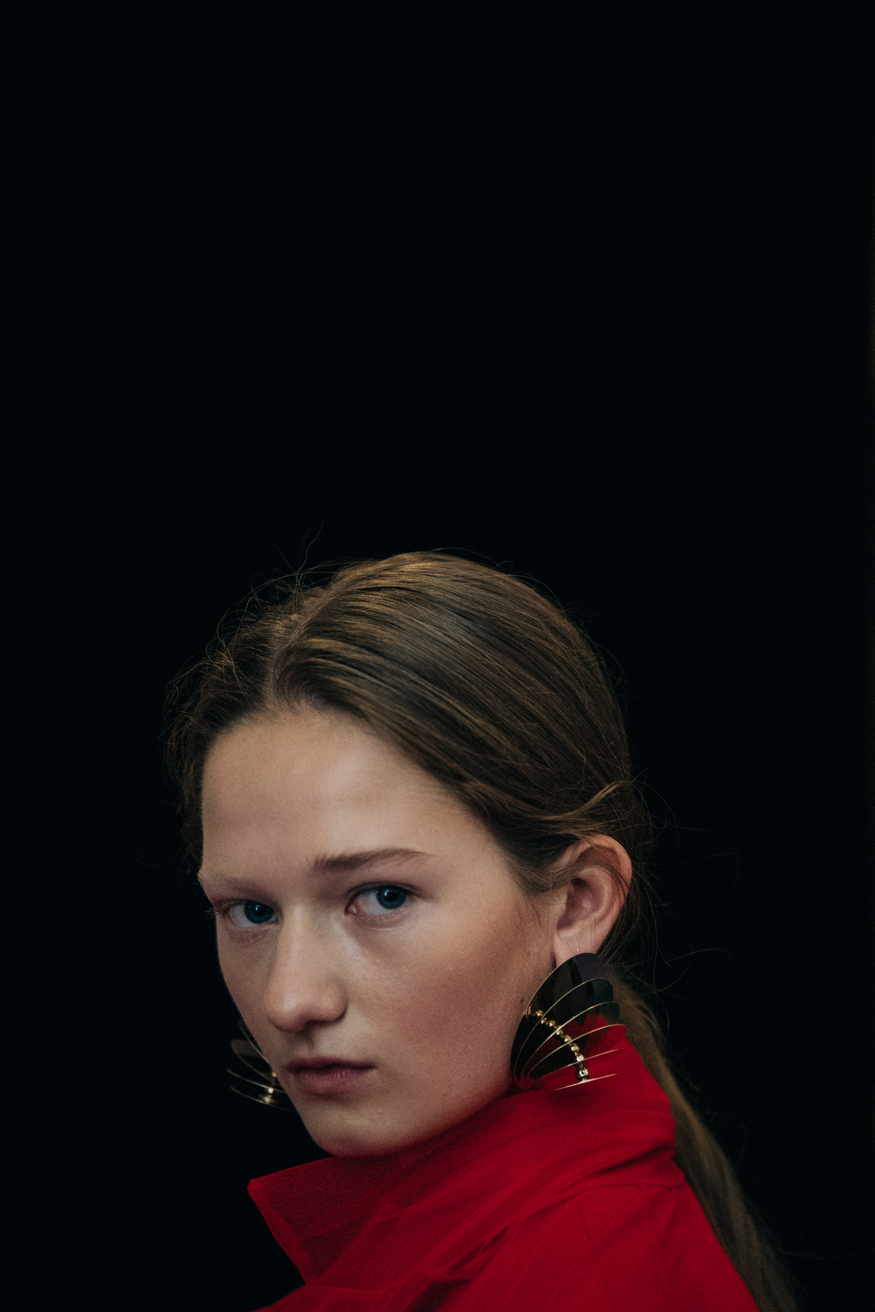 Model wearing red outfit at Y/Project