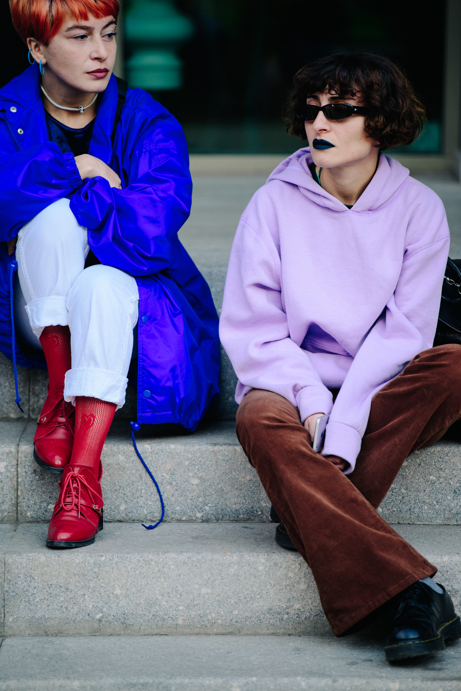 Two women wearing bright colours