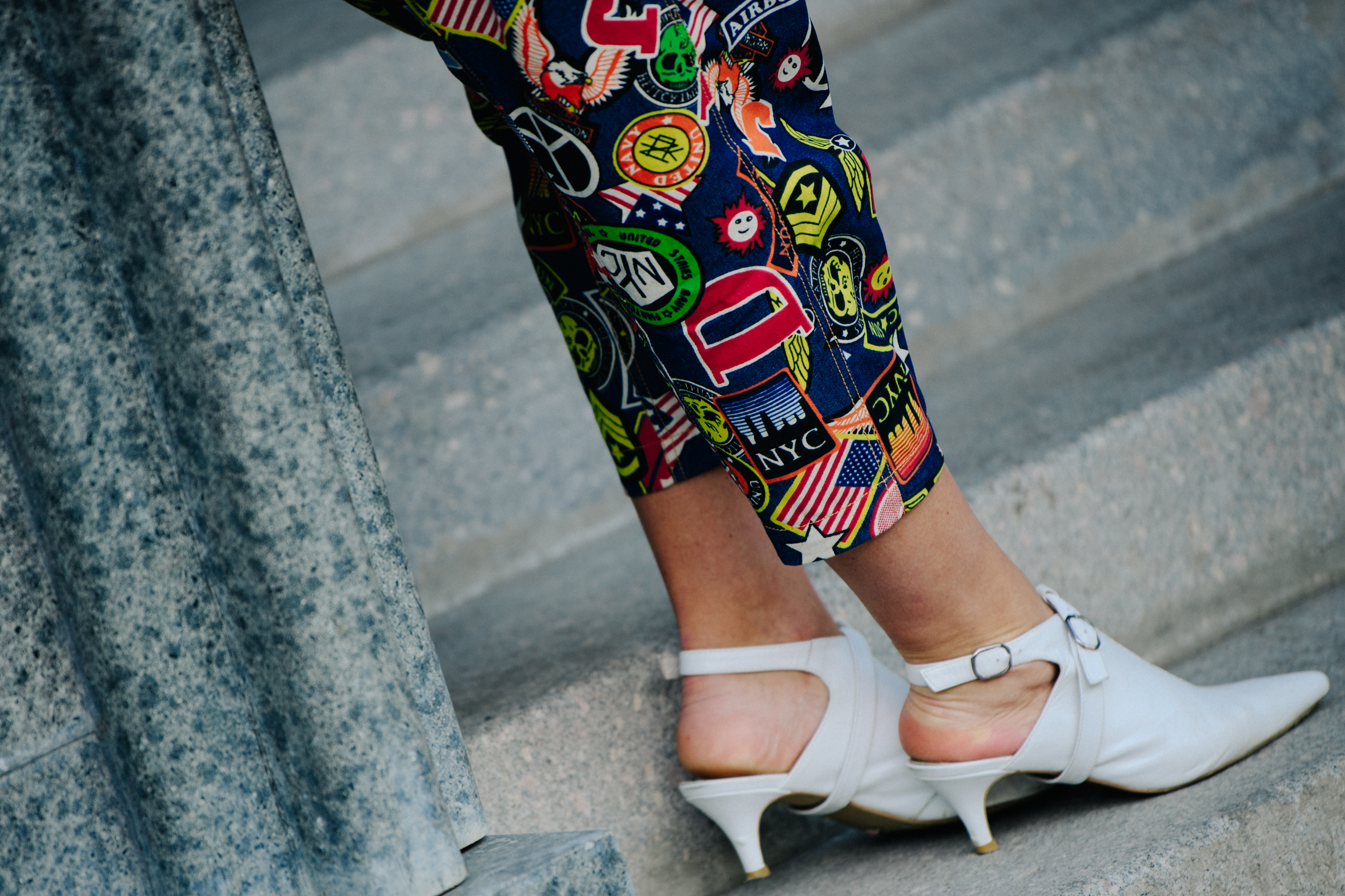 Woman wearing white heels