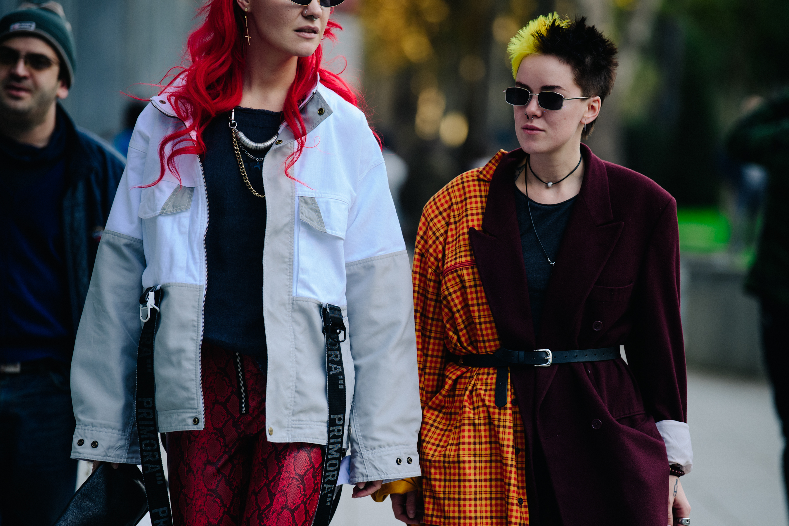 Two women wearing overcoats