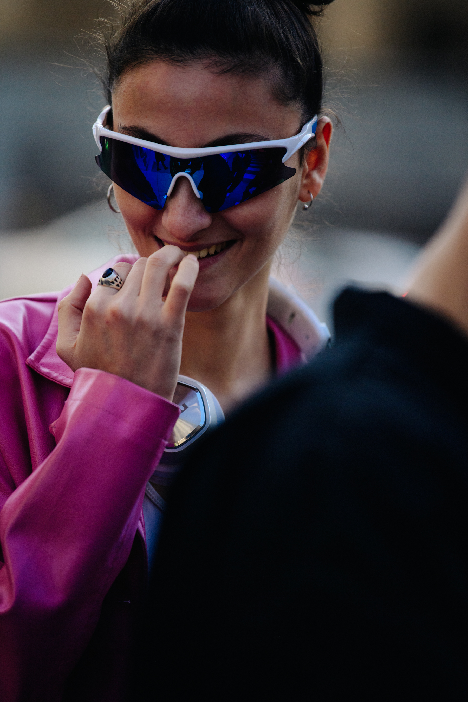 Woman wearing white sunglasses