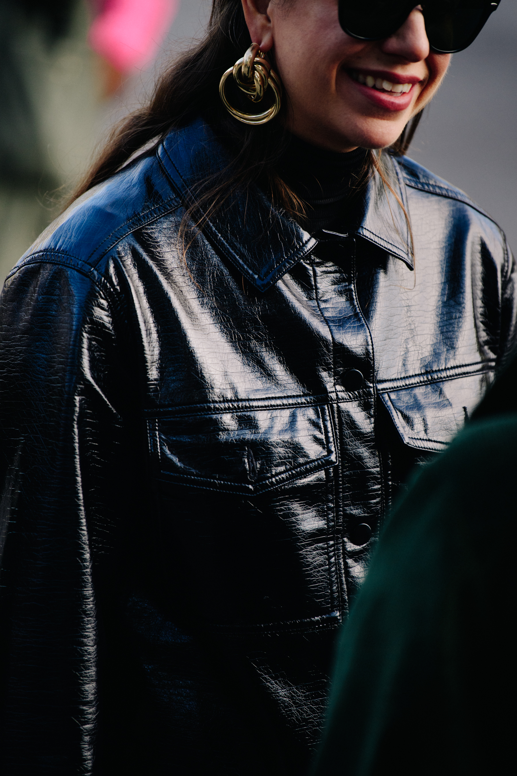 Woman wearing black leather coat