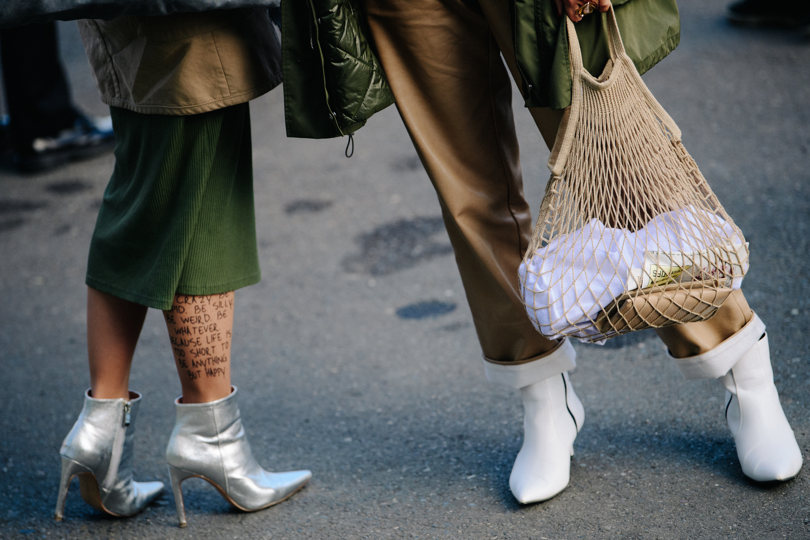 Two women wearing heels