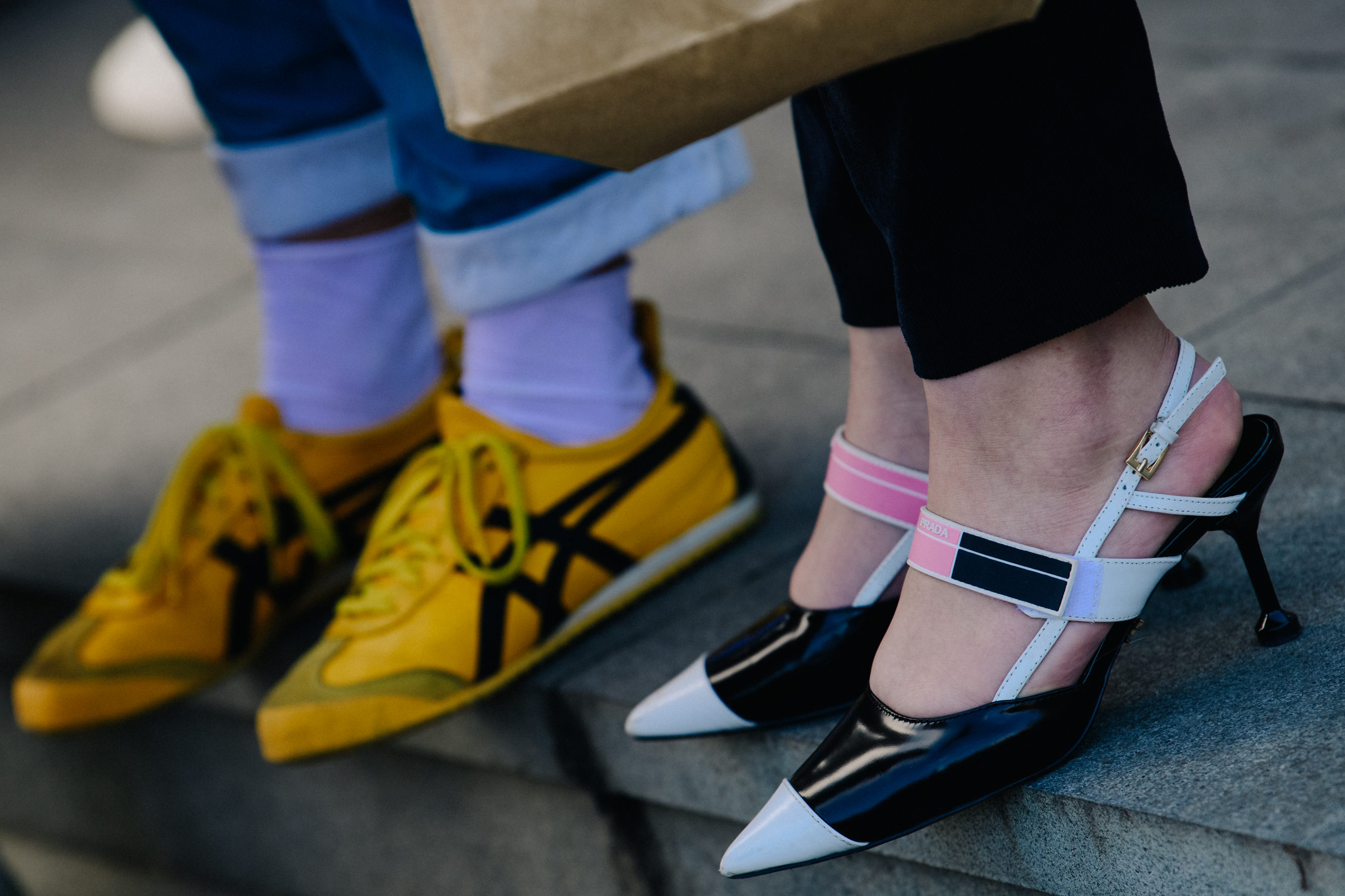 Woman wearing Prada shoes