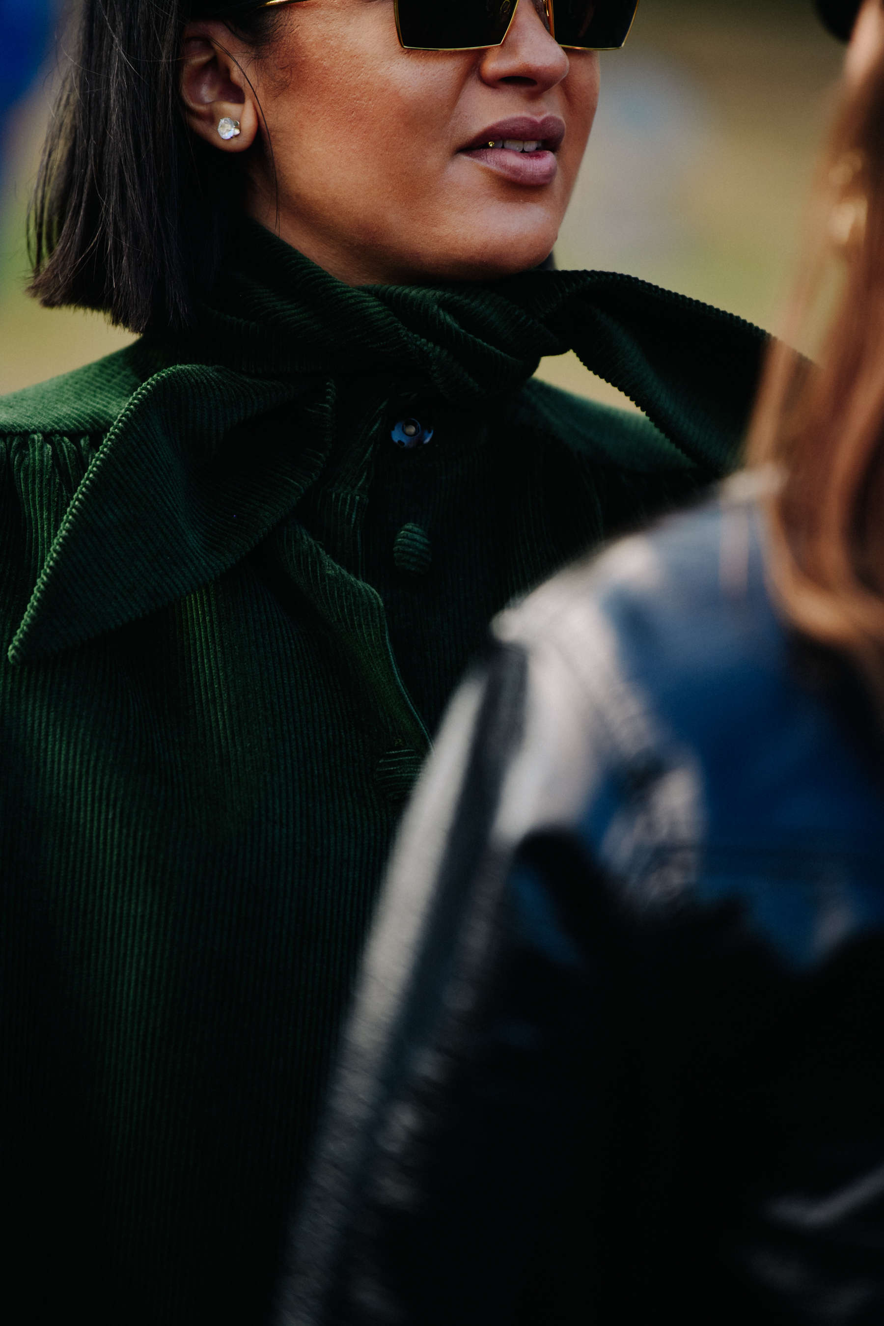 Woman wearing green coat