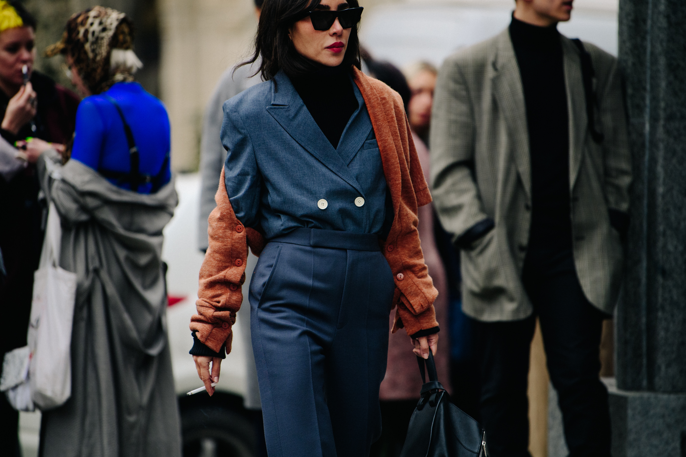 Woman wearing grey suit