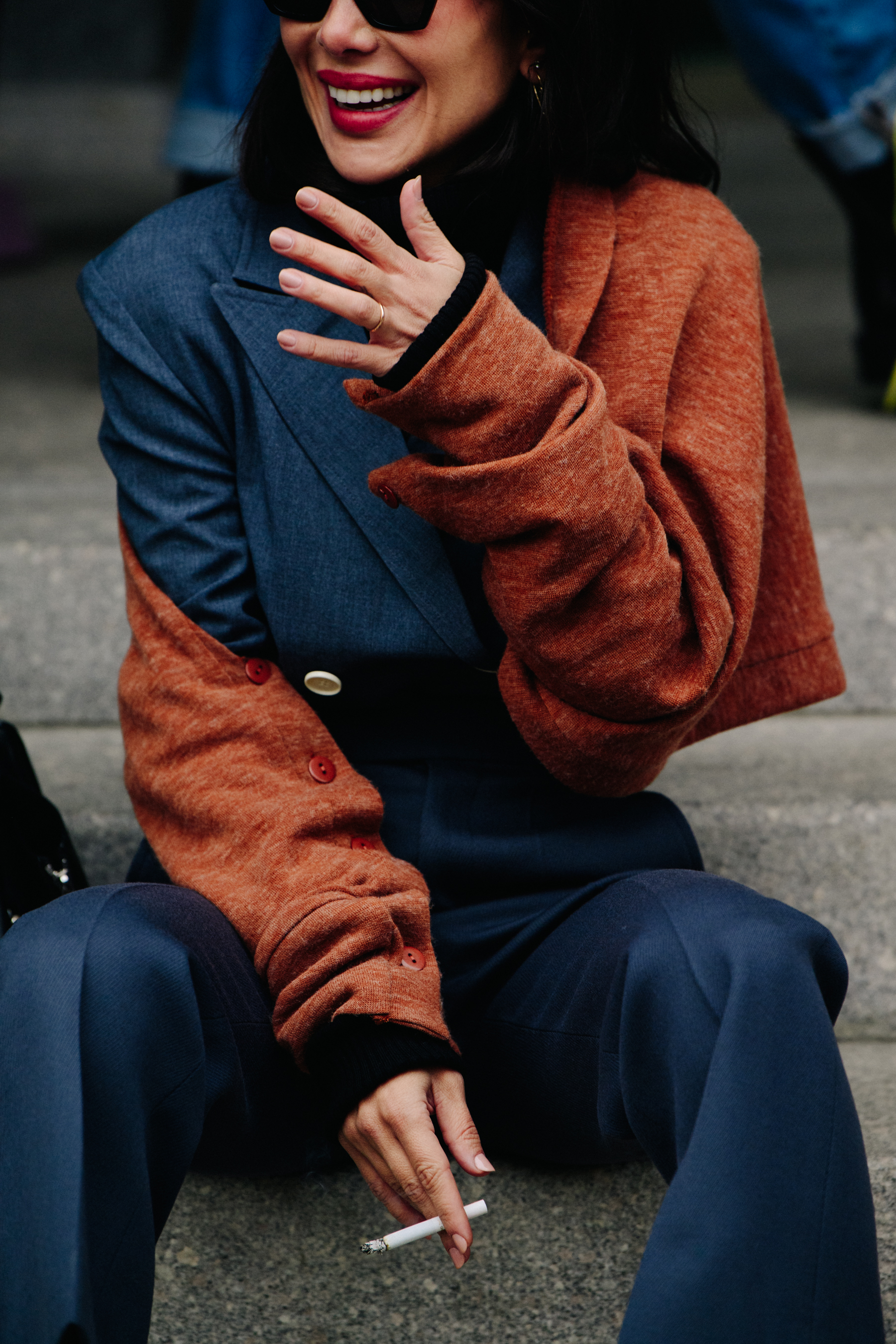 Woman wearing grey suit