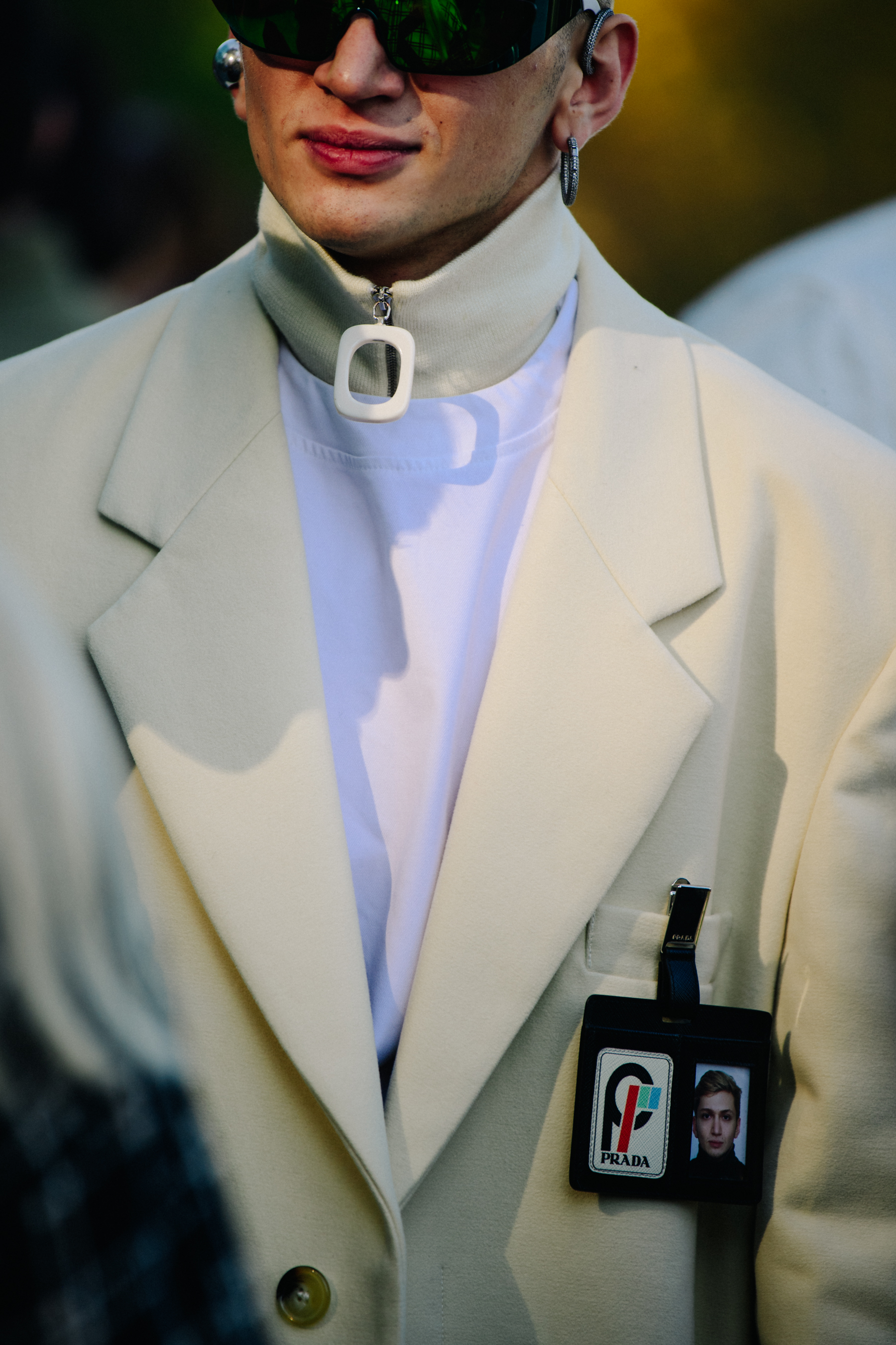 Man wearing white suit jacket