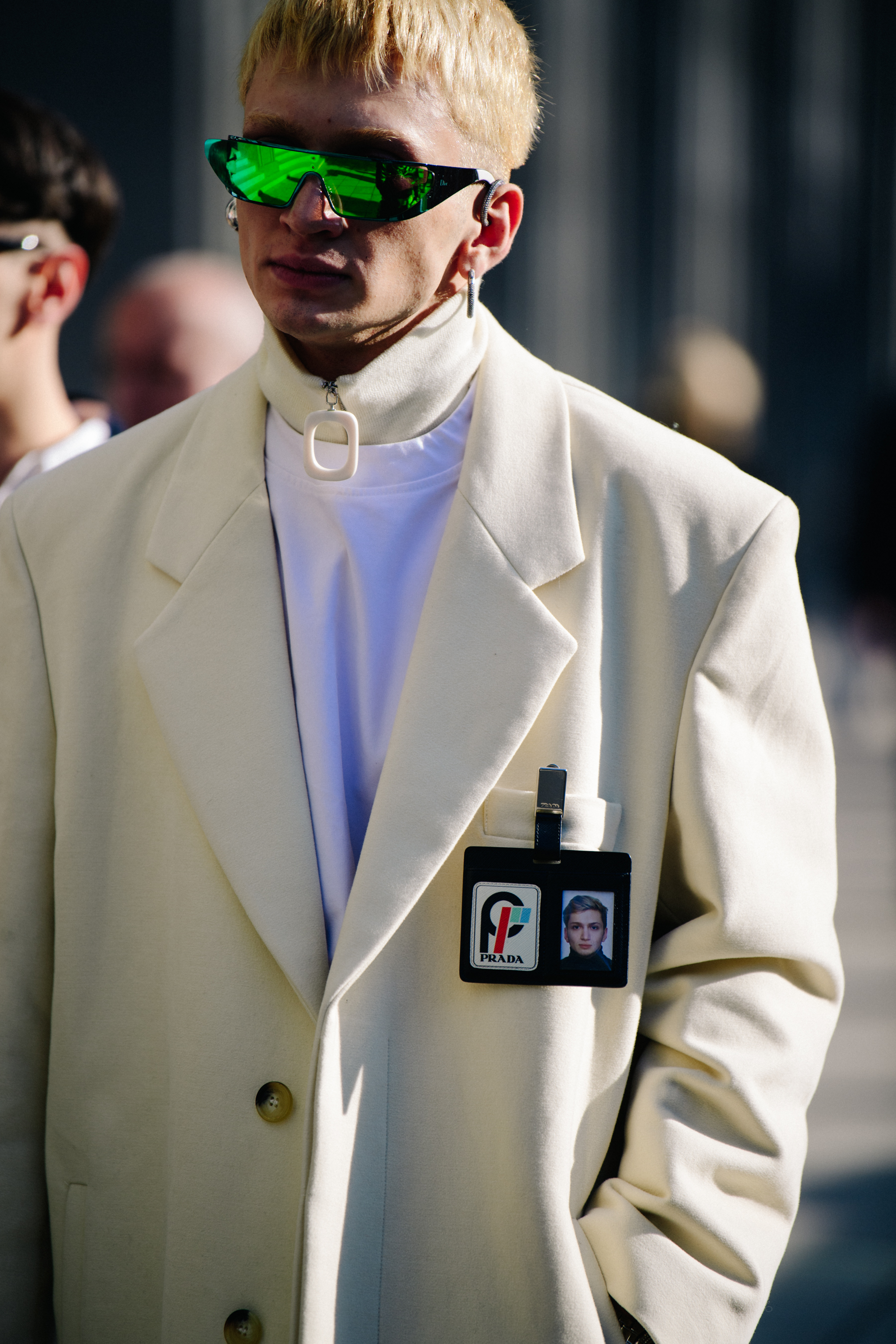 Man wearing white suit jacket