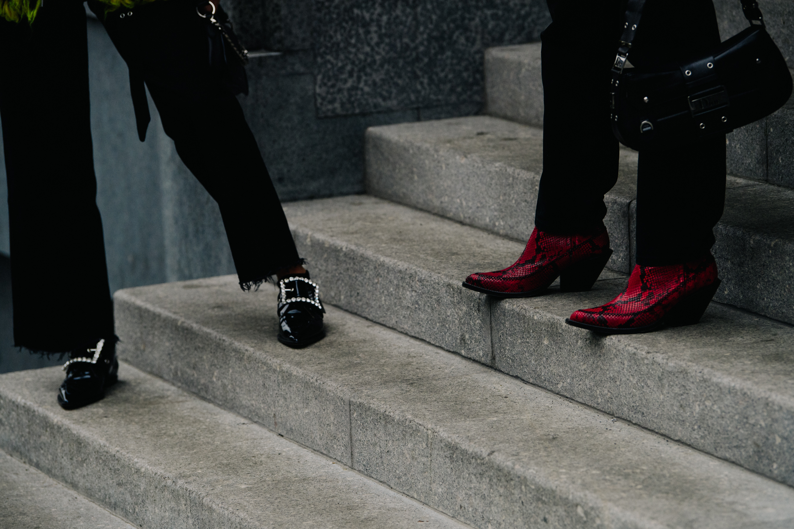 Two women wearing leather shoes