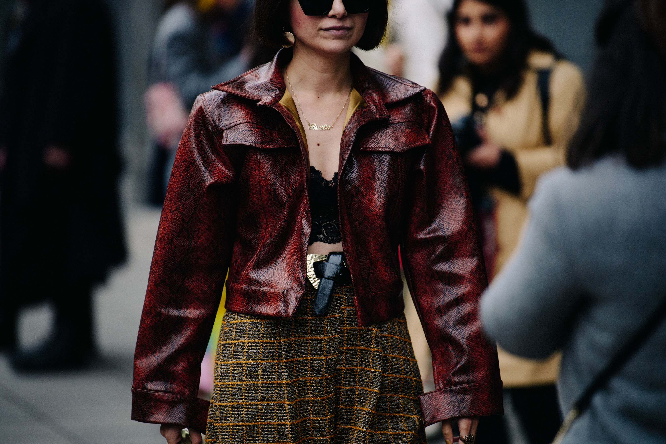 Woman wearing red leather jacket
