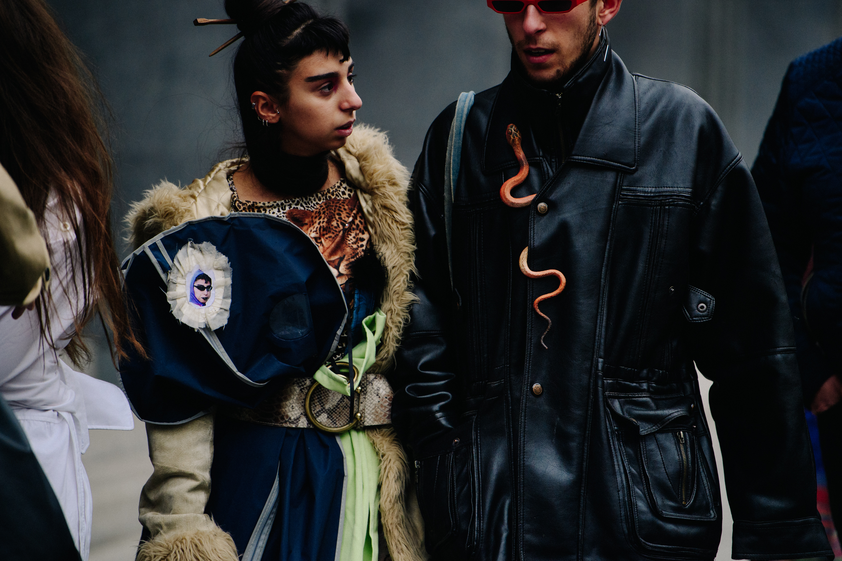 Couple wearing dark outfits