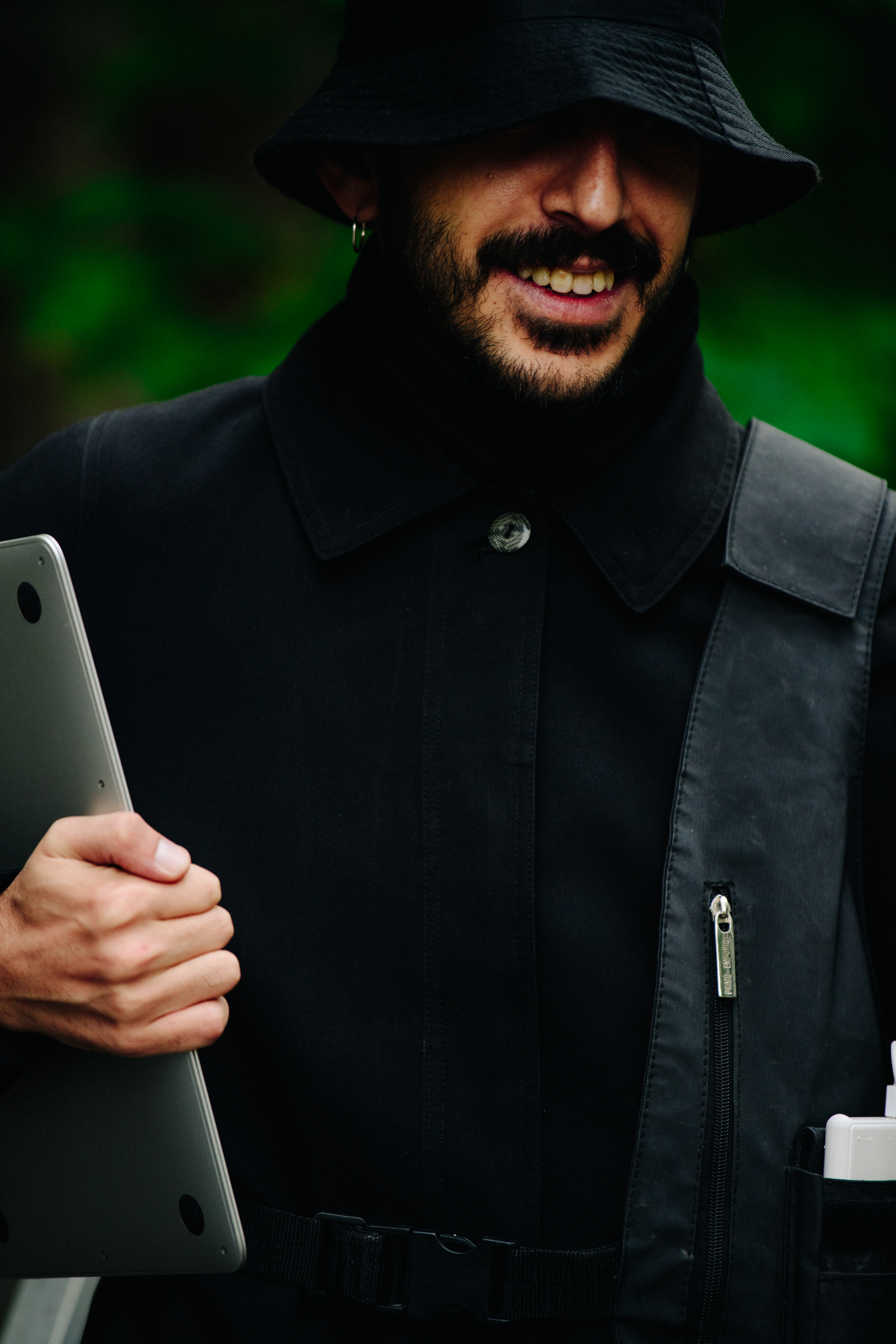 Man carrying MacBook