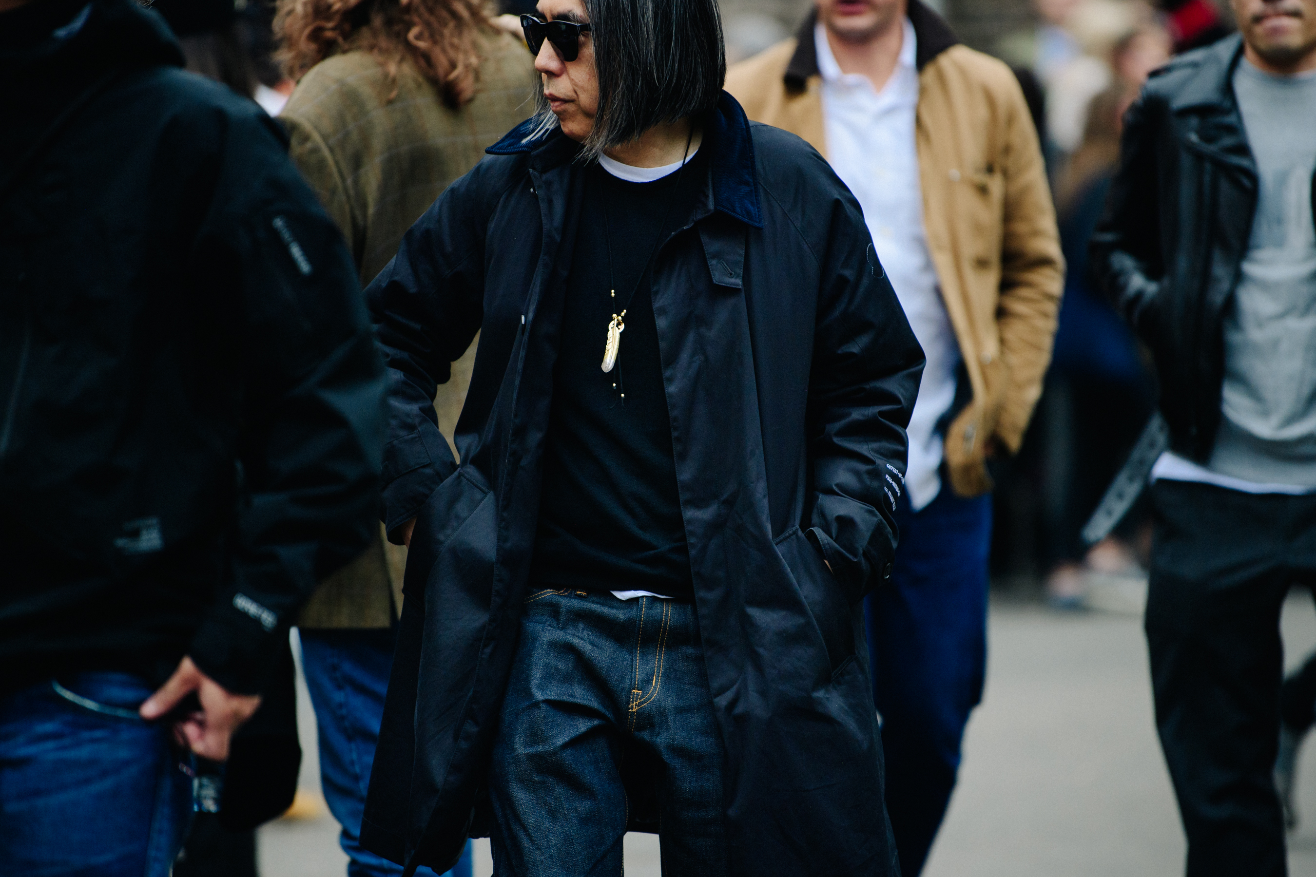 Japanese man wearing black outfit