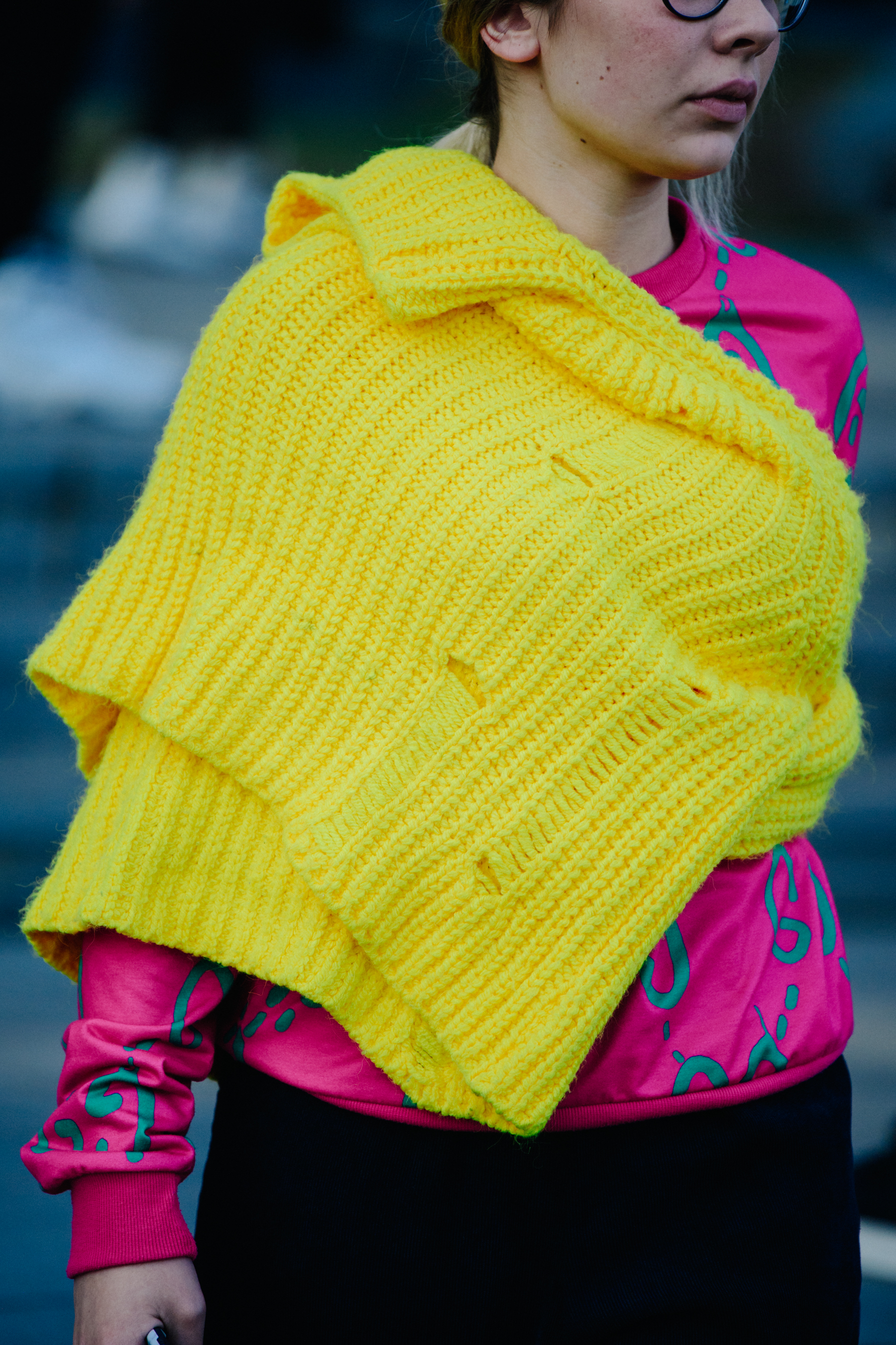 Woman wearing yellow jumper