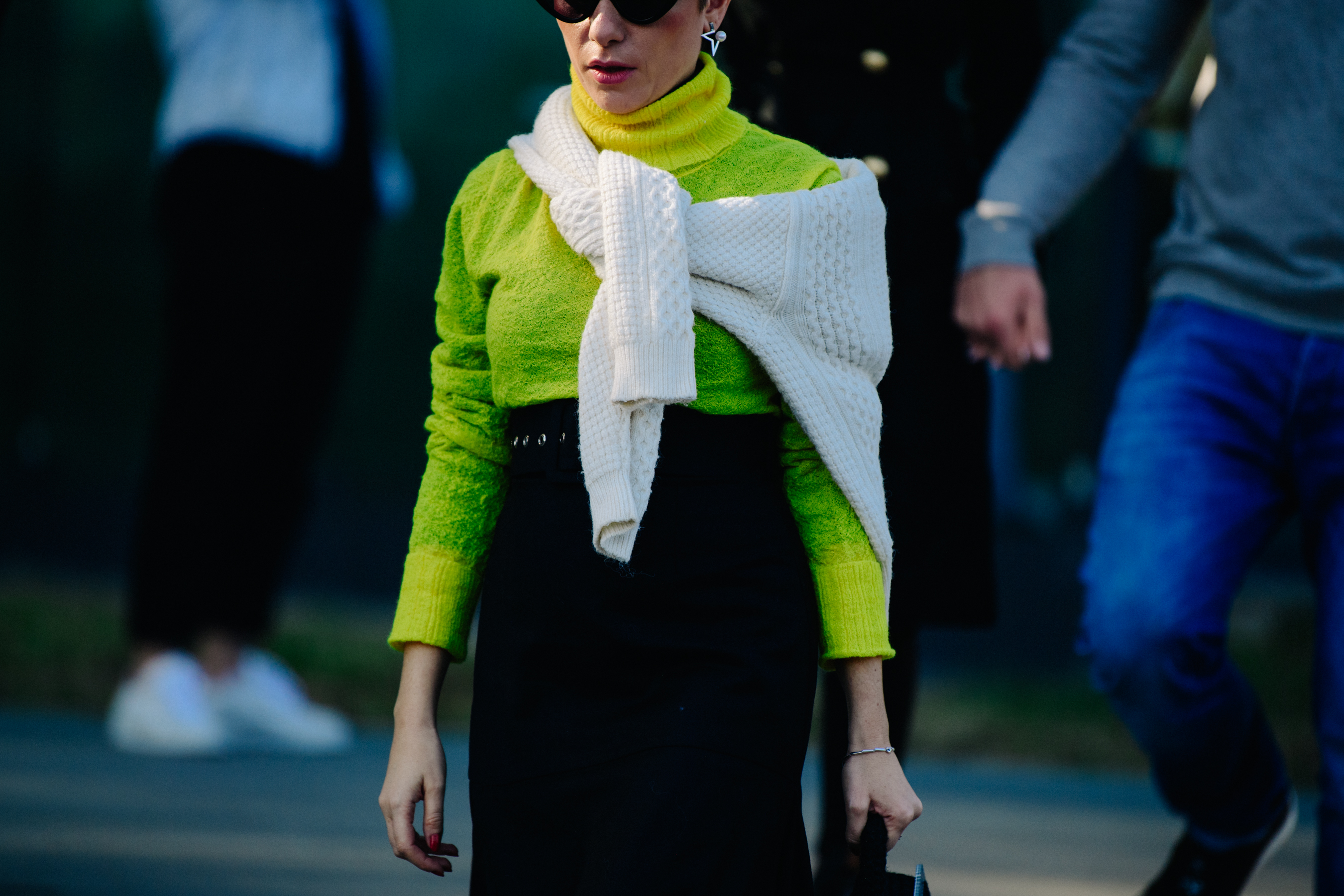 Woman wearing yellow jumper