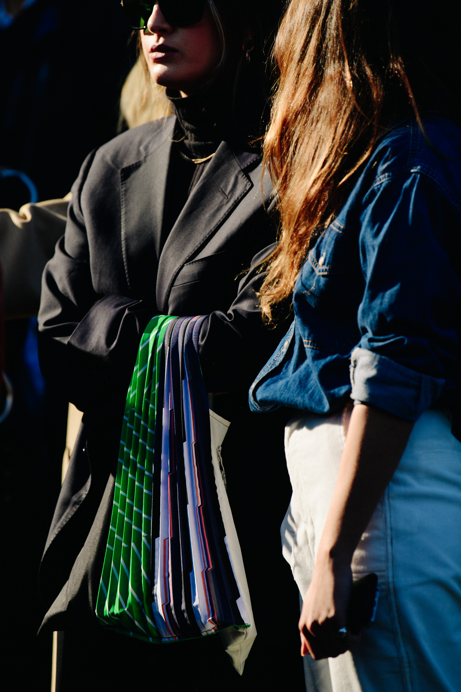 Two Turkish women wearing dark clothing