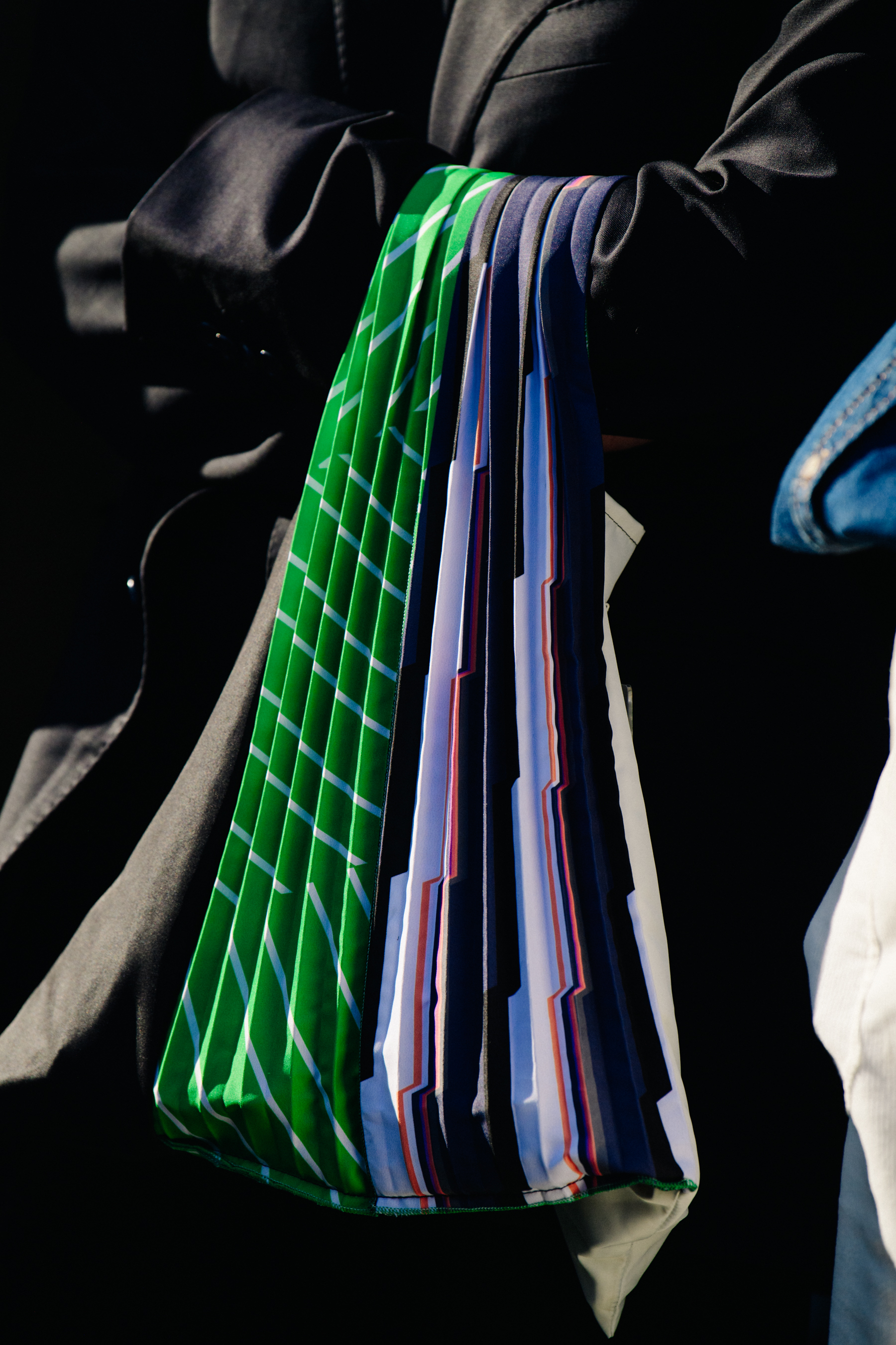Woman carrying colourful bag