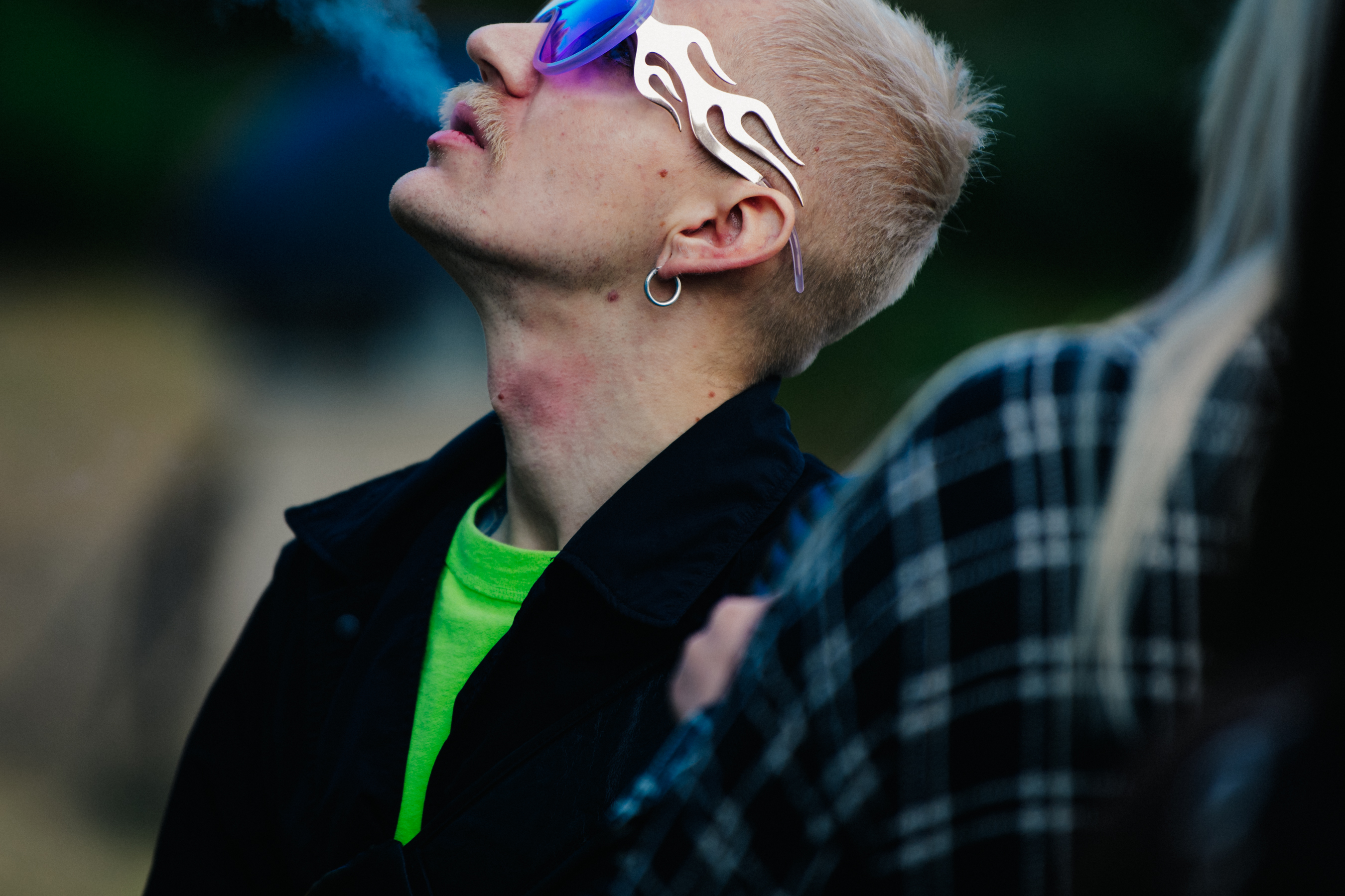Man wearing bright green shirt