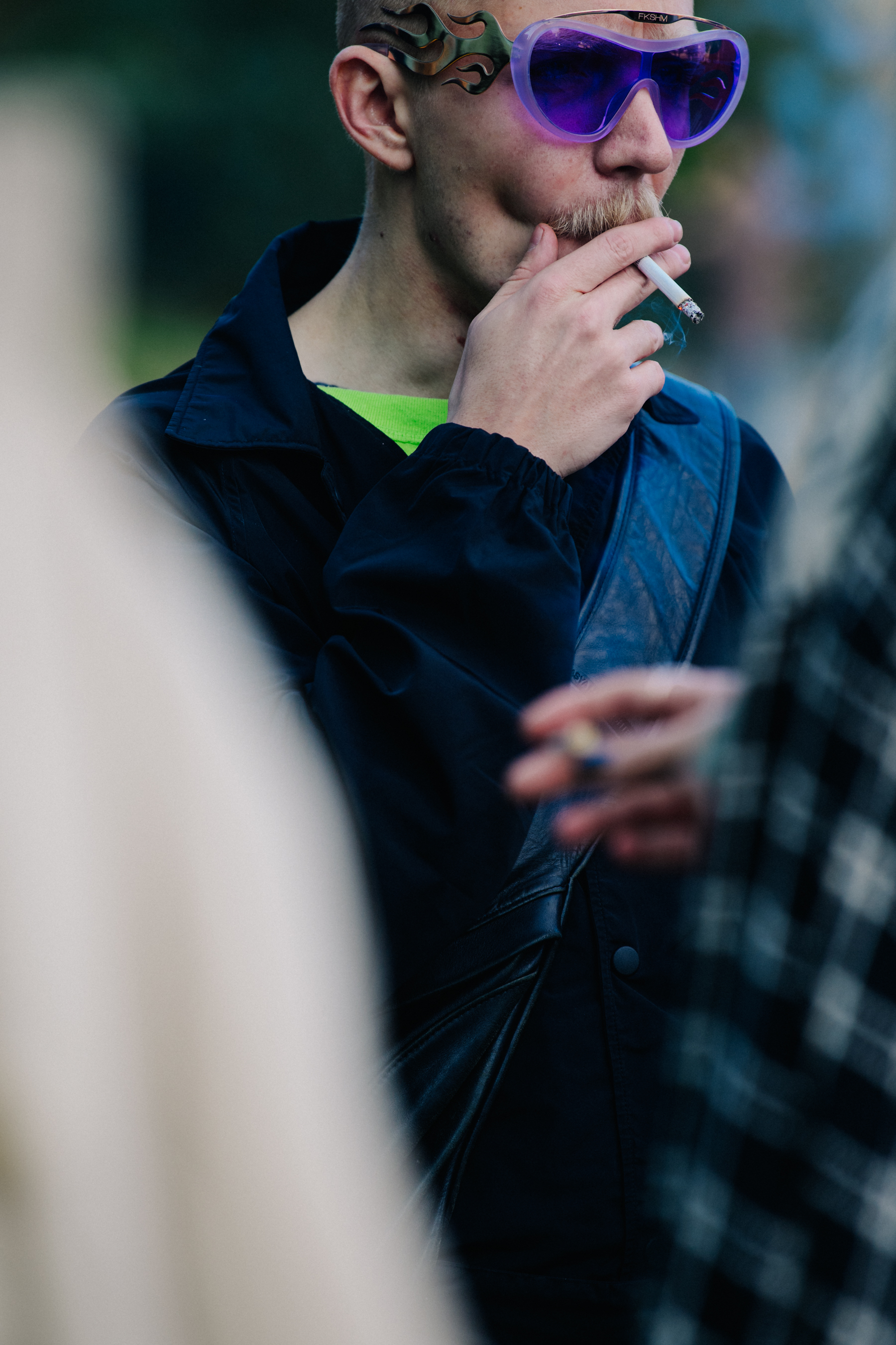 Man wearing large sunglasses