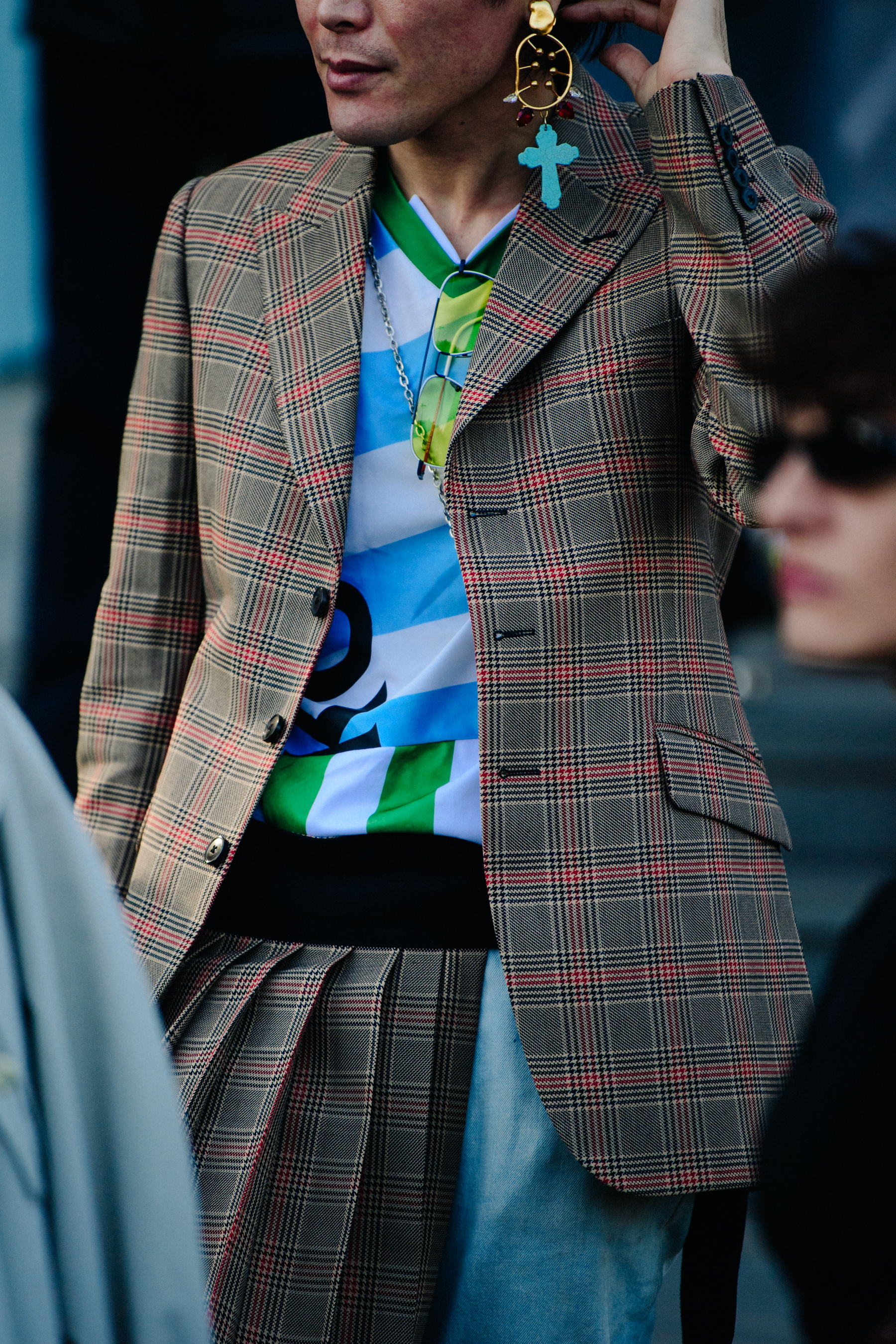 Japanese man wearing striped shirt