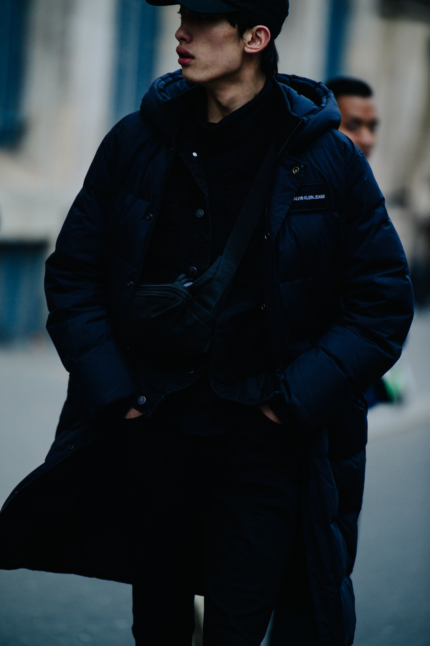 Man wearing black Calvin Klein coat