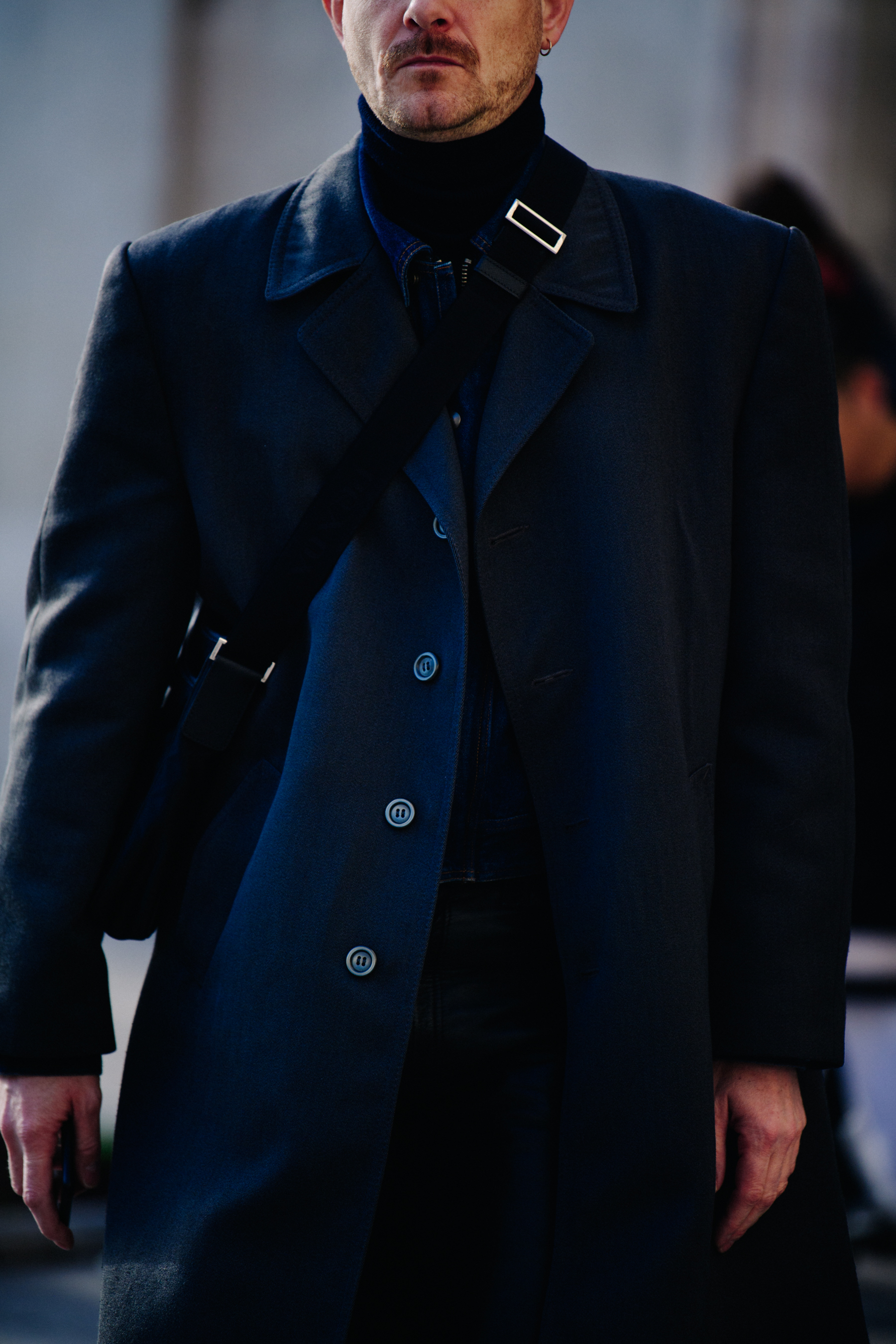 Man wearing navy coat