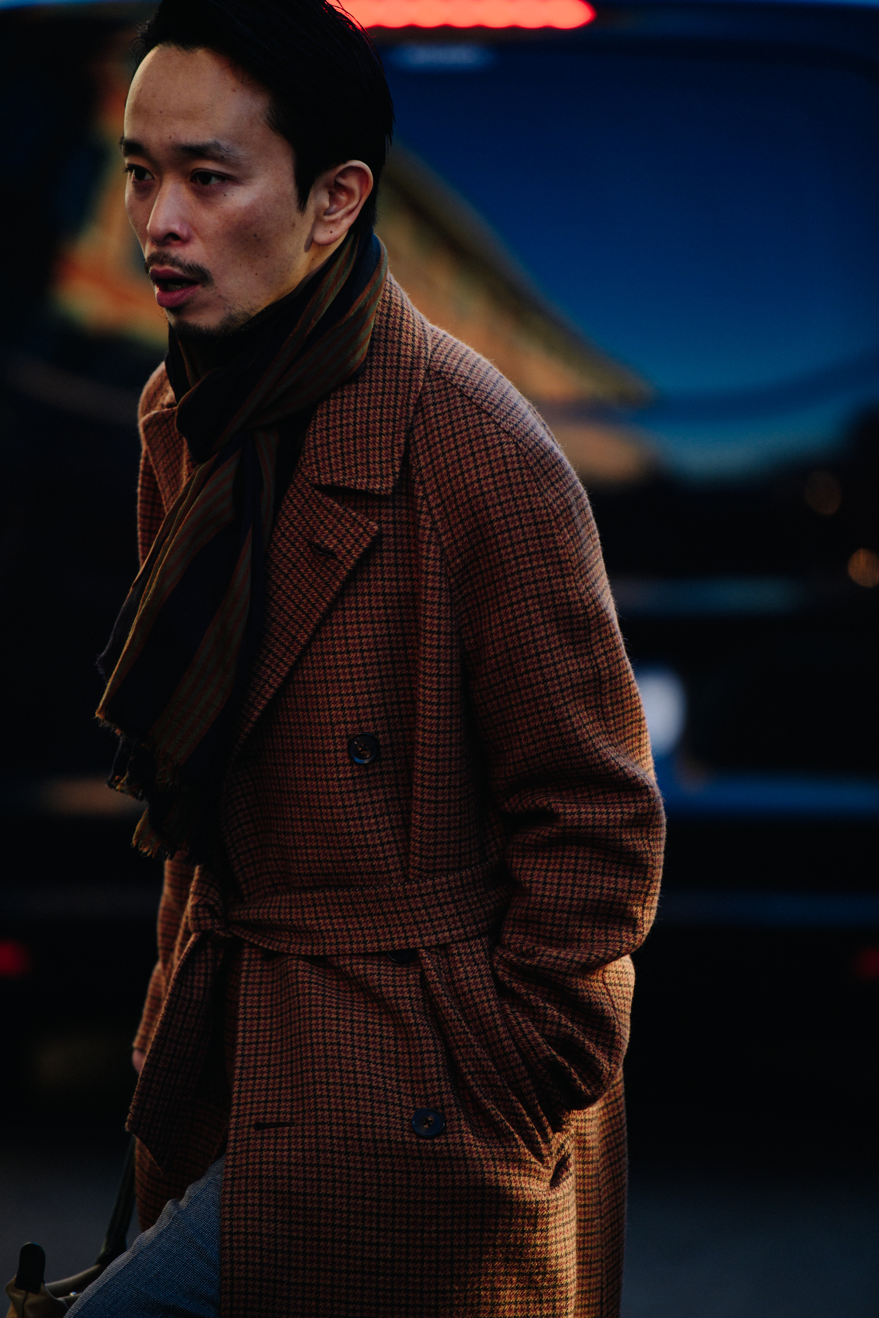 Asian man wearing wool coat