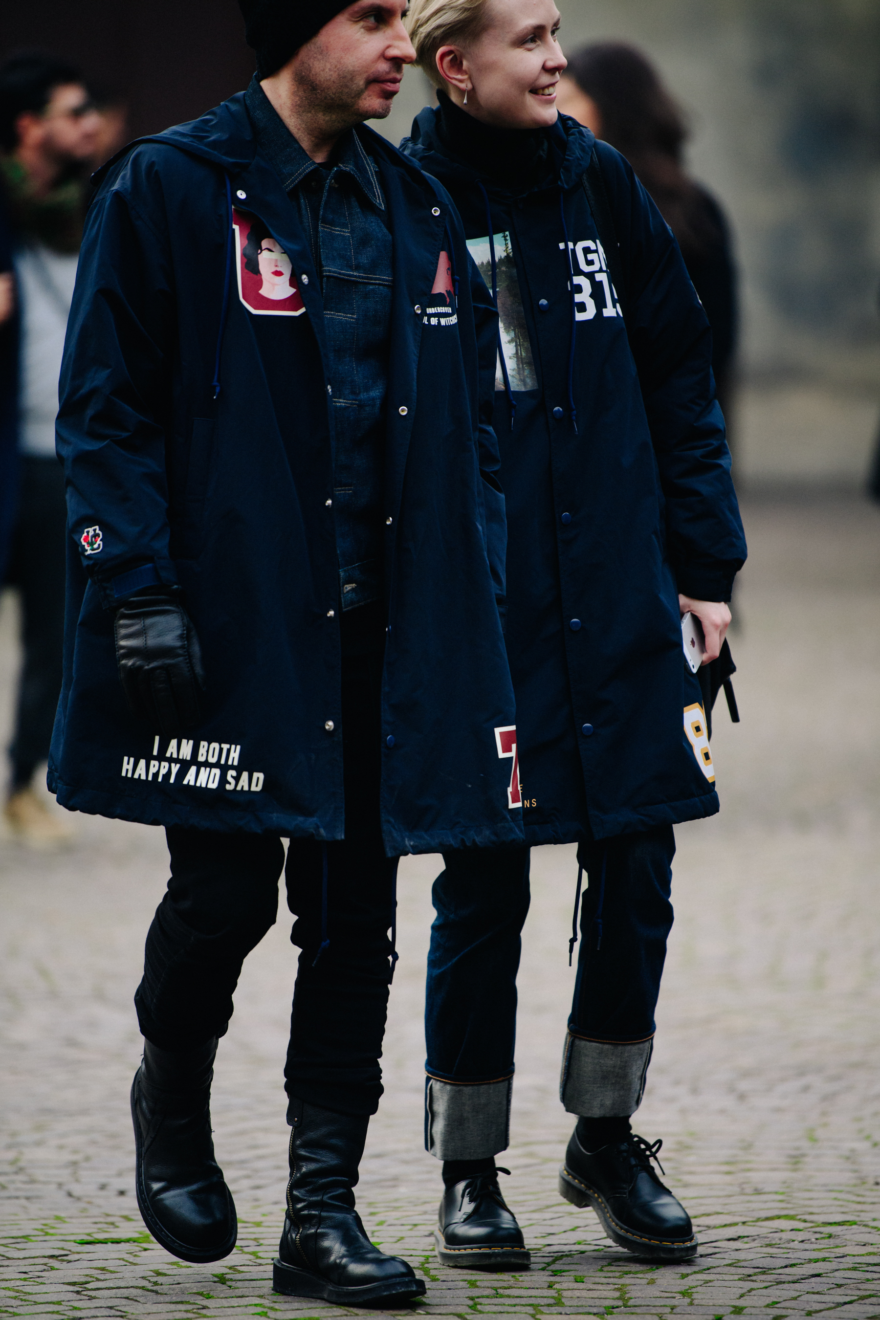 Couple wearing black coats