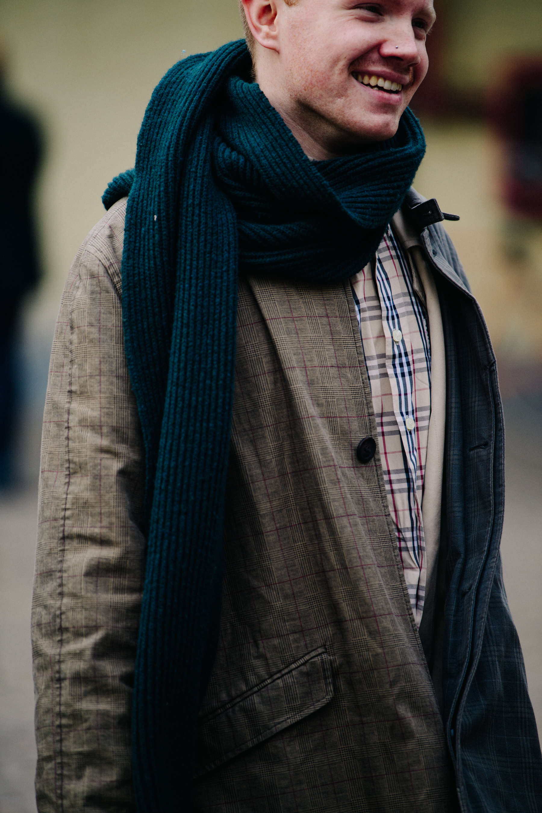 Man wearing grey and check
